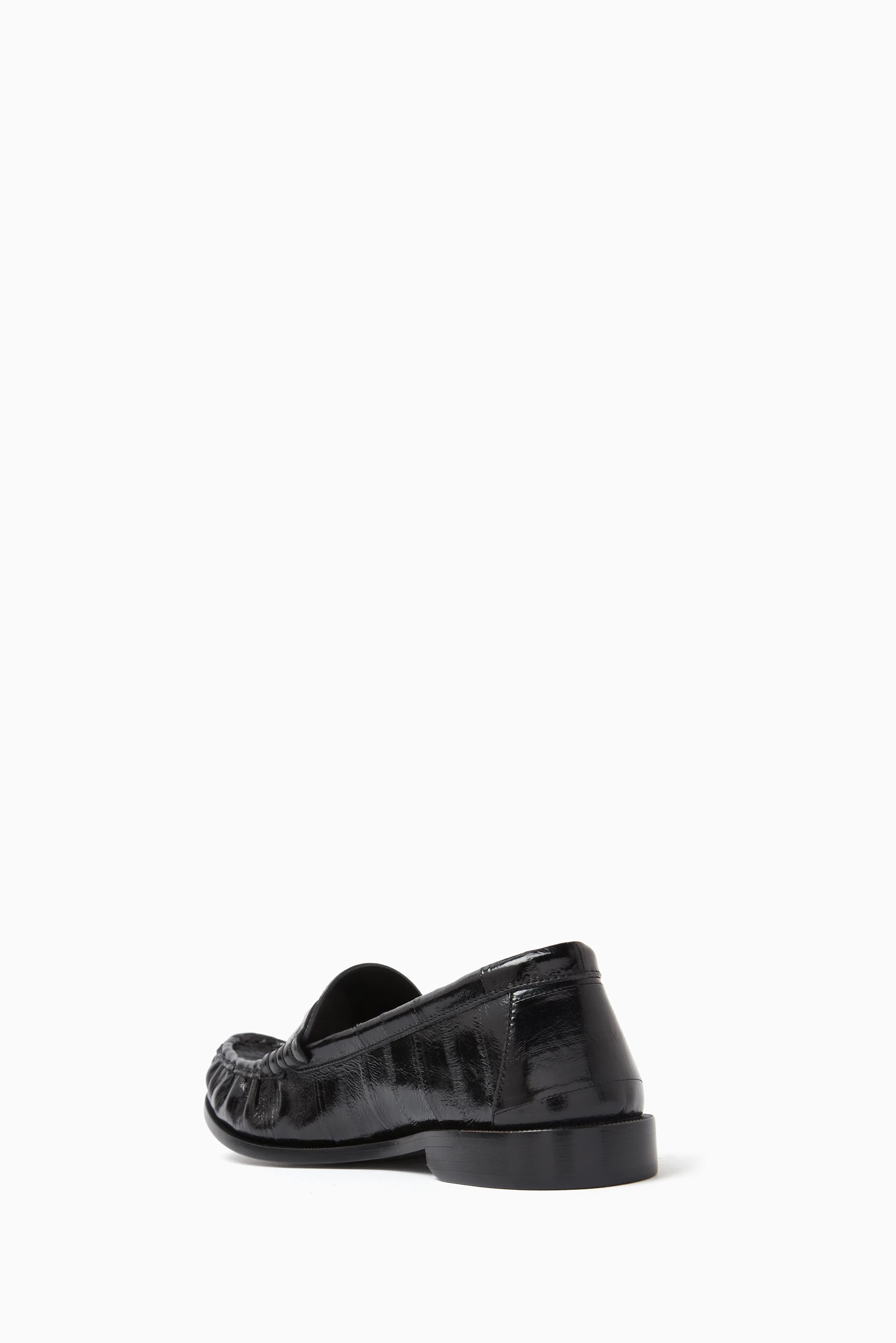 Buy SAINT LAURENT Black Penny Loafers in Eel Leather for Women in UAE Ounass