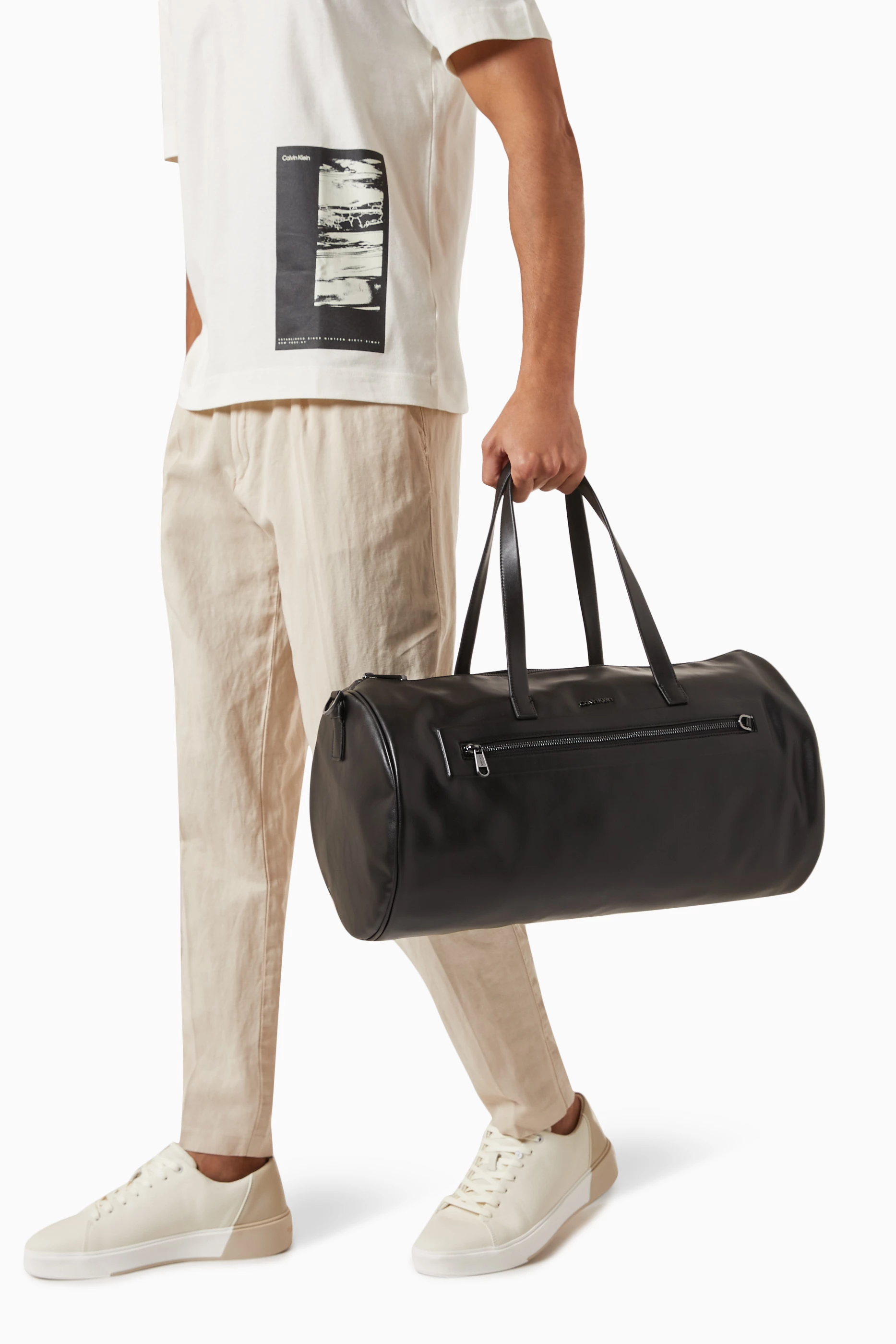 Buy Calvin Klein Black Duffle Bag in Faux Leather for Men in UAE