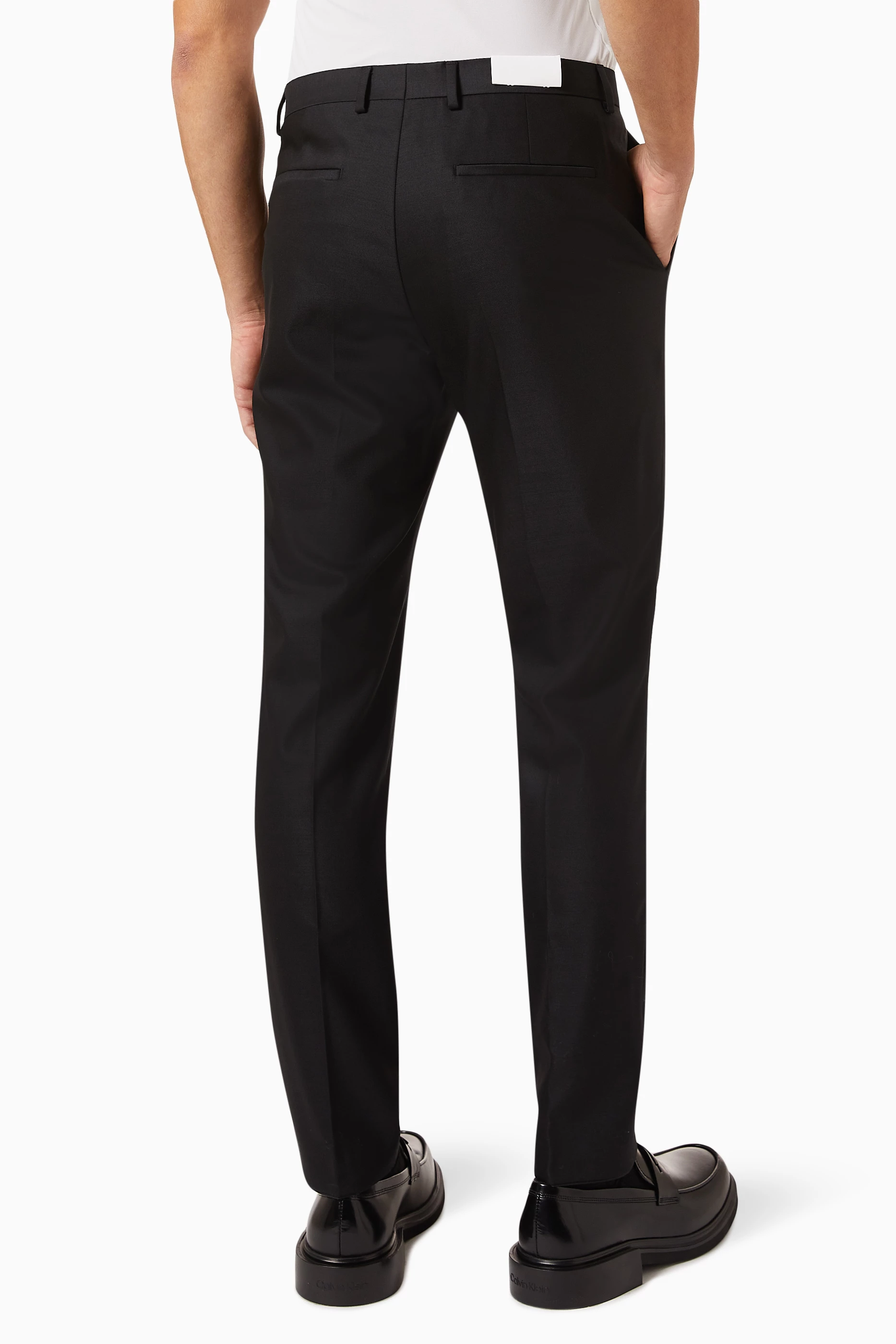 Buy Calvin Klein Black Evening Trousers in Wool Stretch for Men in UAE Ounass