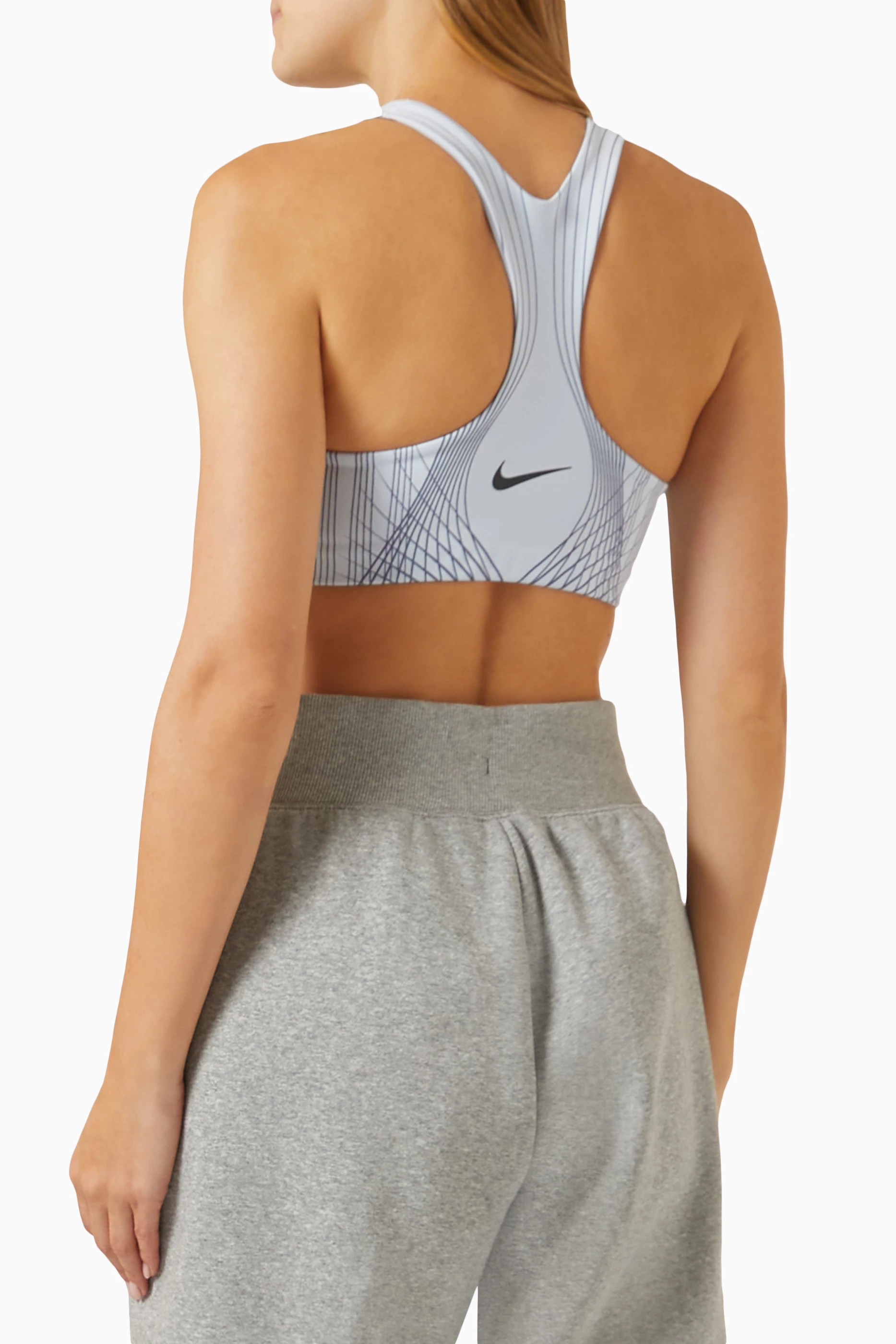 Buy Nike Blue Swoosh High-neck Sports Bra for Women in UAE
