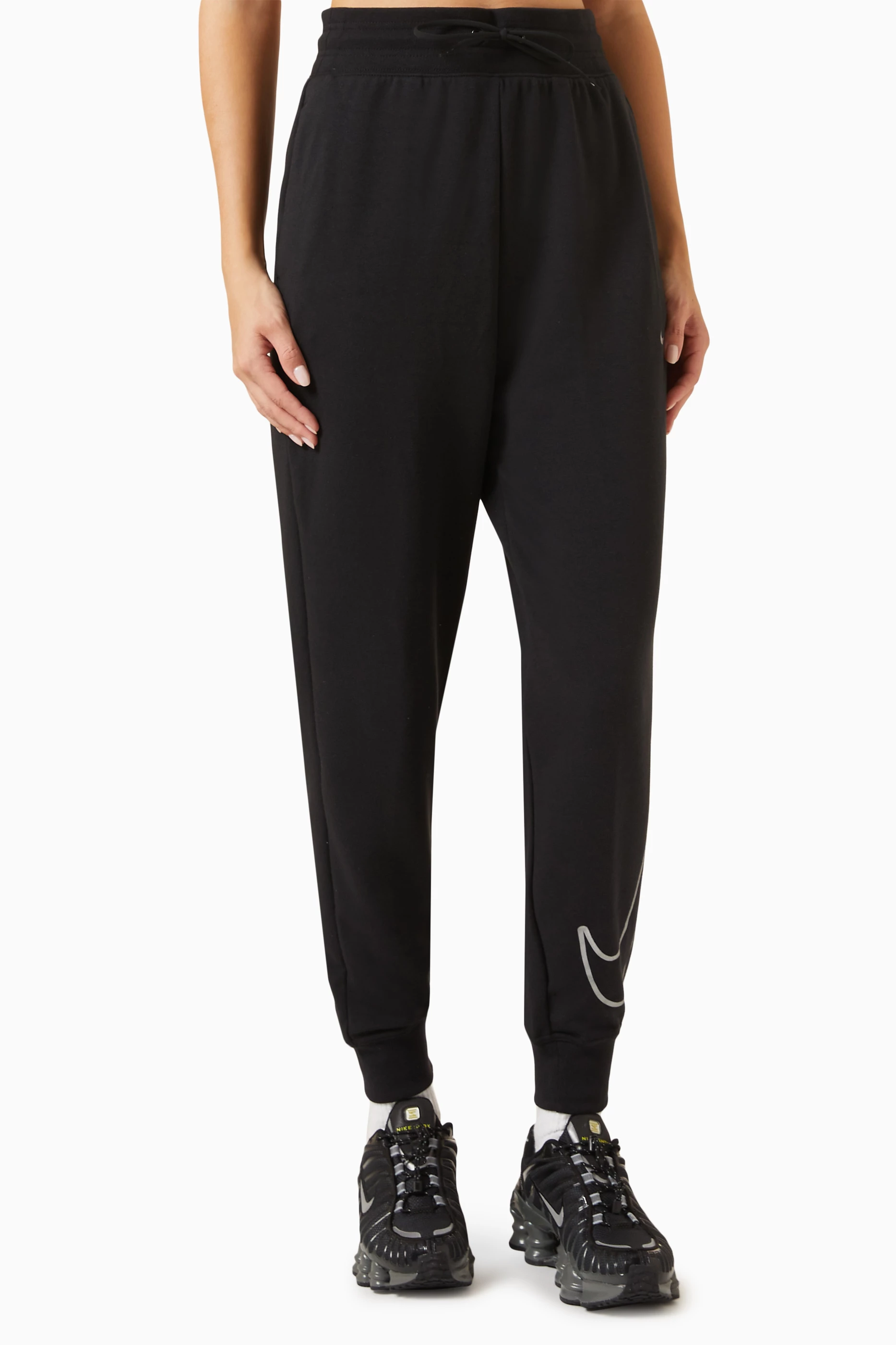 Buy Nike Black One 7/8 Graphic Pants in French Terry for Women in UAE