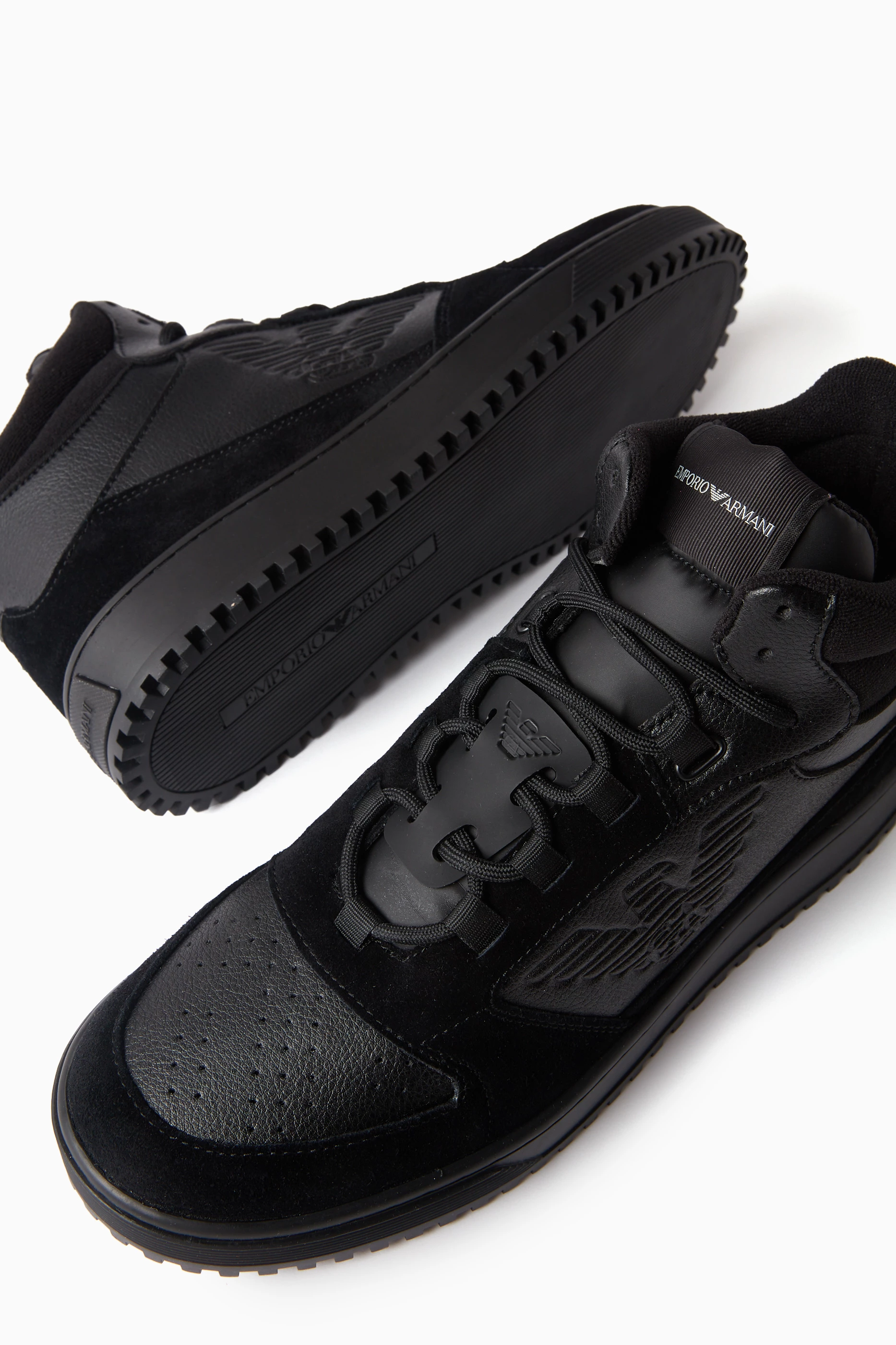 Buy Emporio Armani Black EA Eagle High top Sneakers in Suede