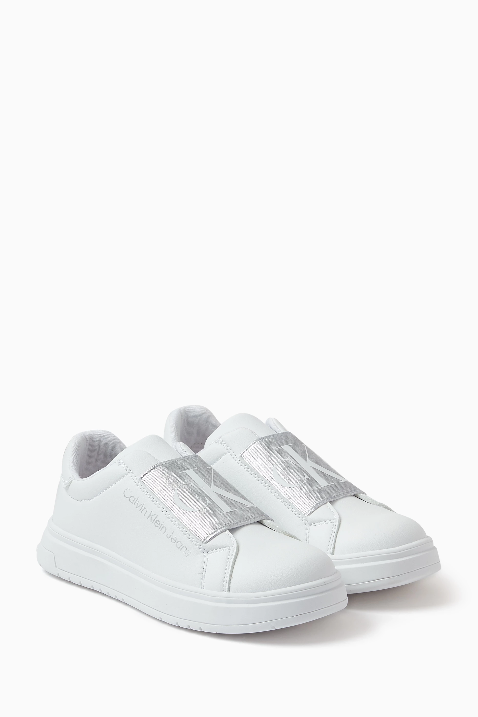 Calvin klein white slip on discount shoes