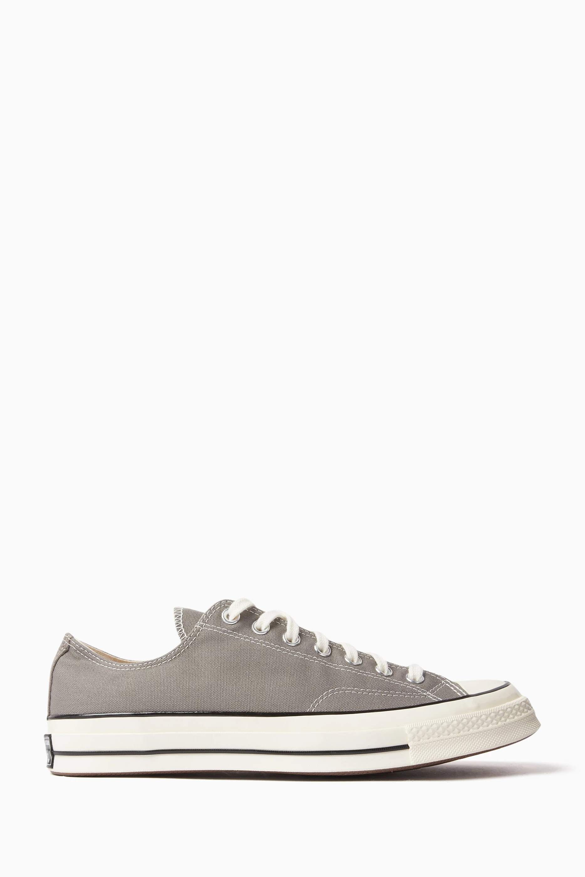 Light grey low top outlet converse