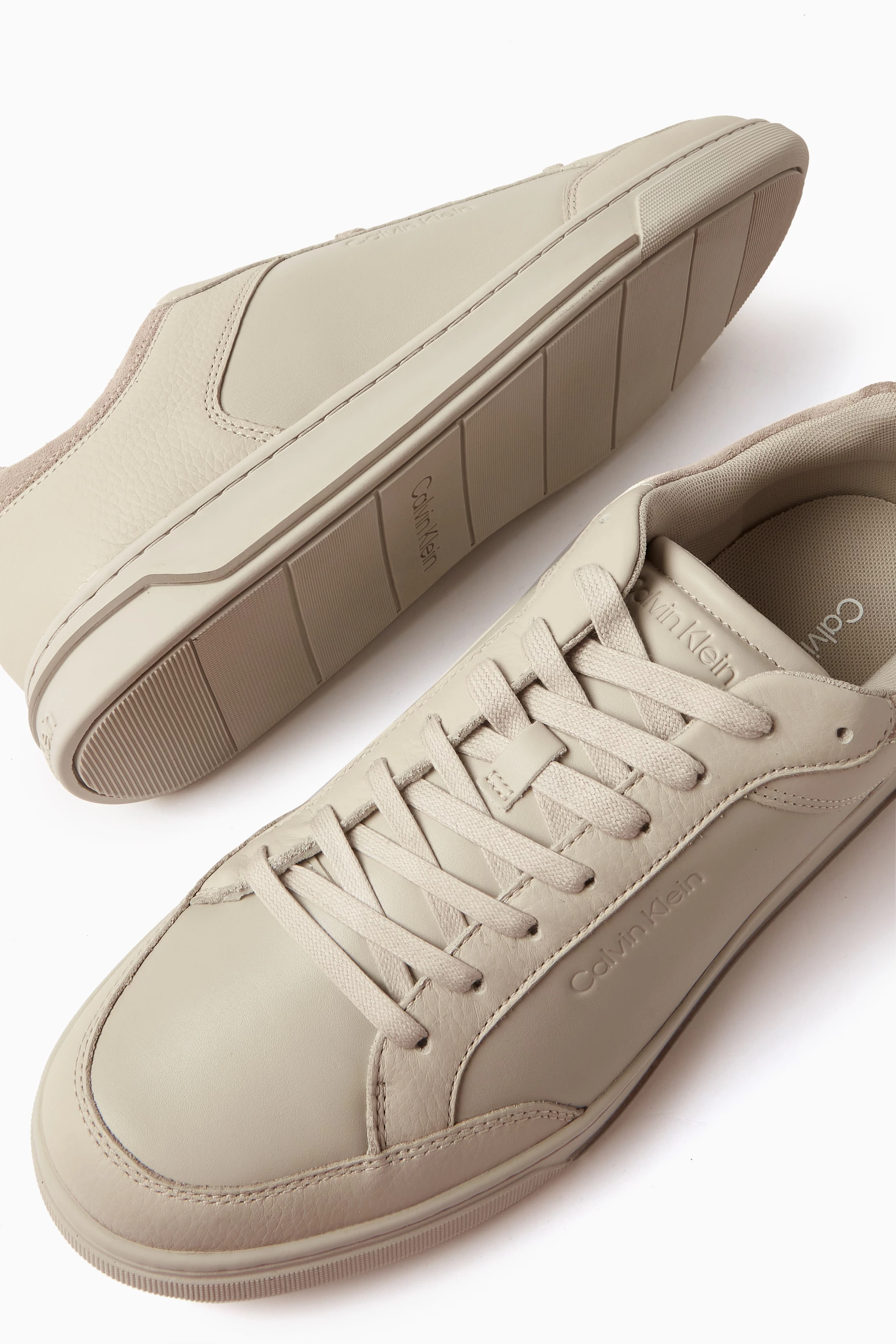 Calvin klein grey sneakers deals