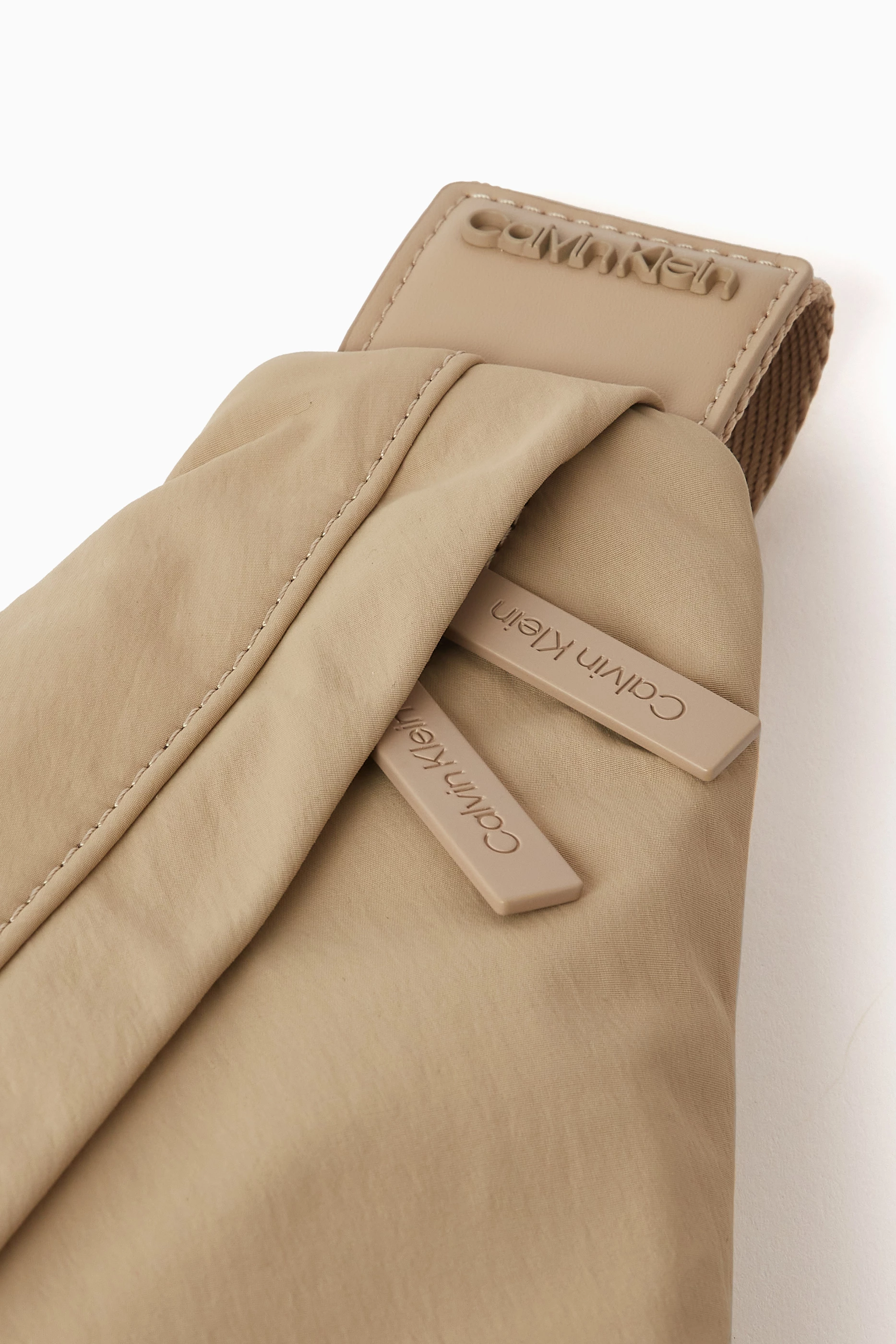 Calvin klein sling on sale