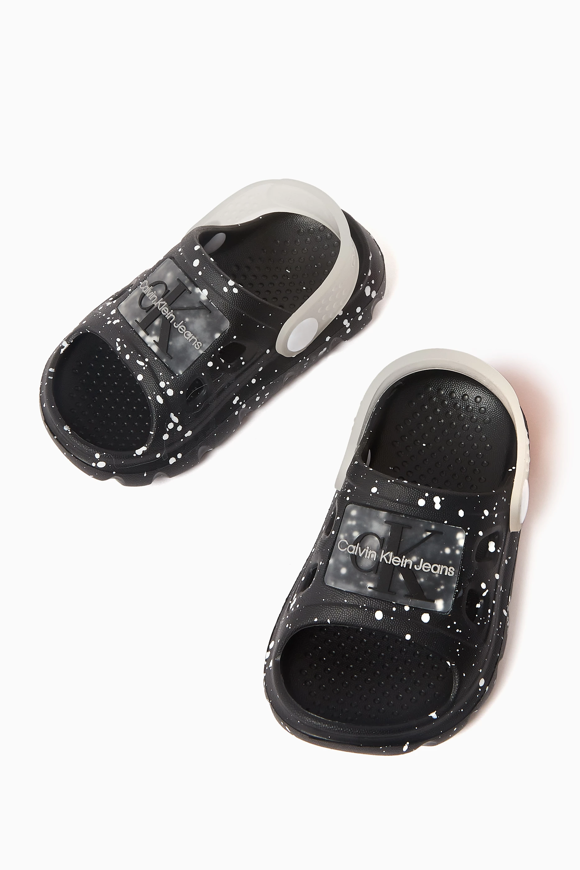 Buy Calvin Klein Black All over Paint splatter Sandals in Rubber