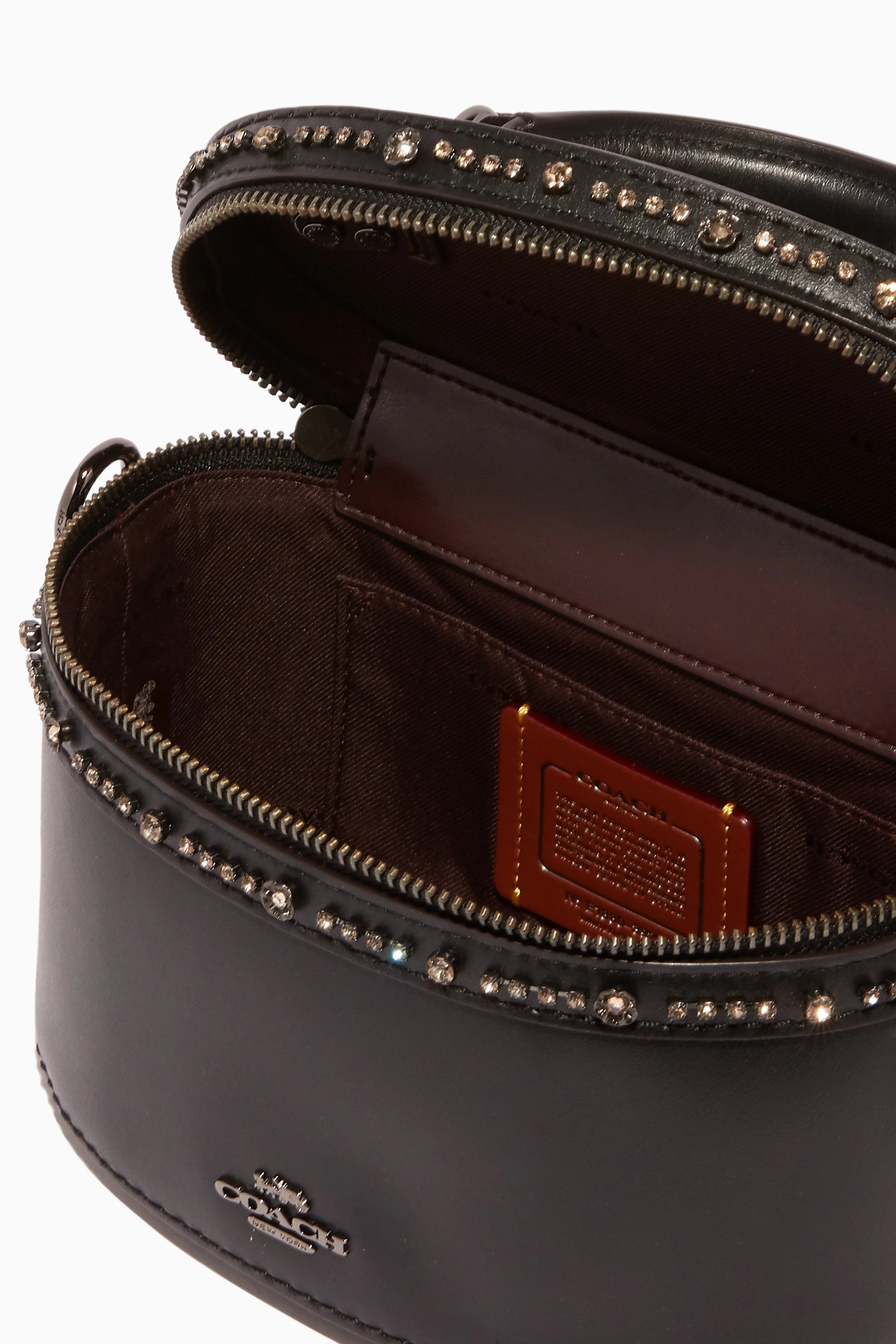 Coach x selena gomez crystal embellished trail bag on sale