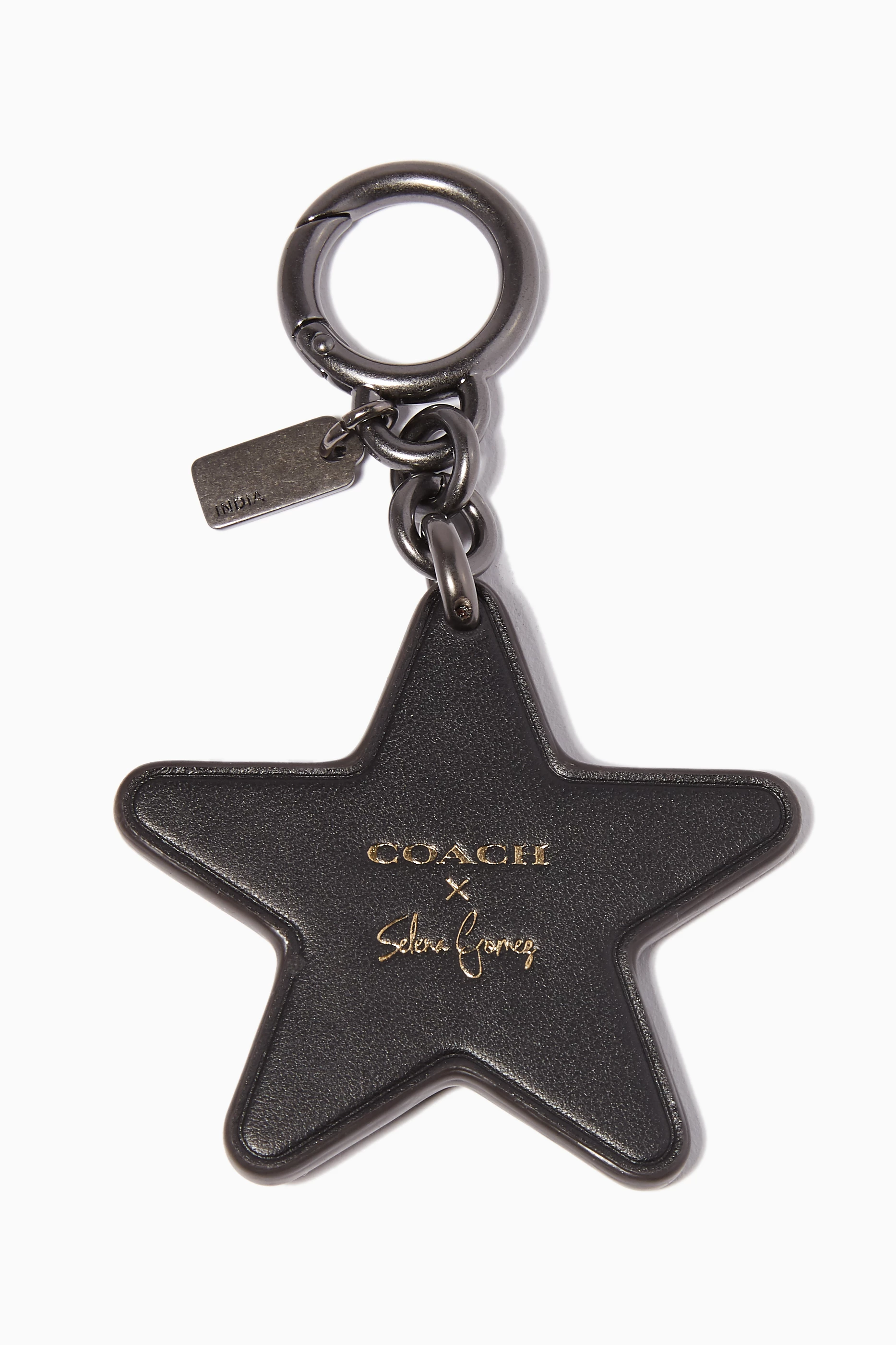 Coach star bag charm hot sale
