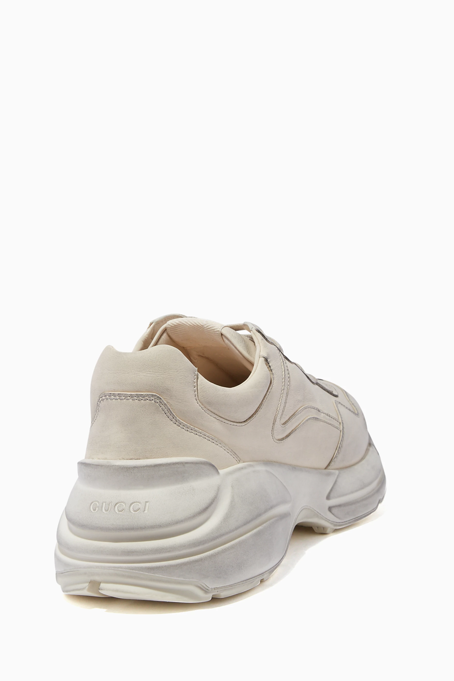 Gucci rhyton distressed leather sneakers online