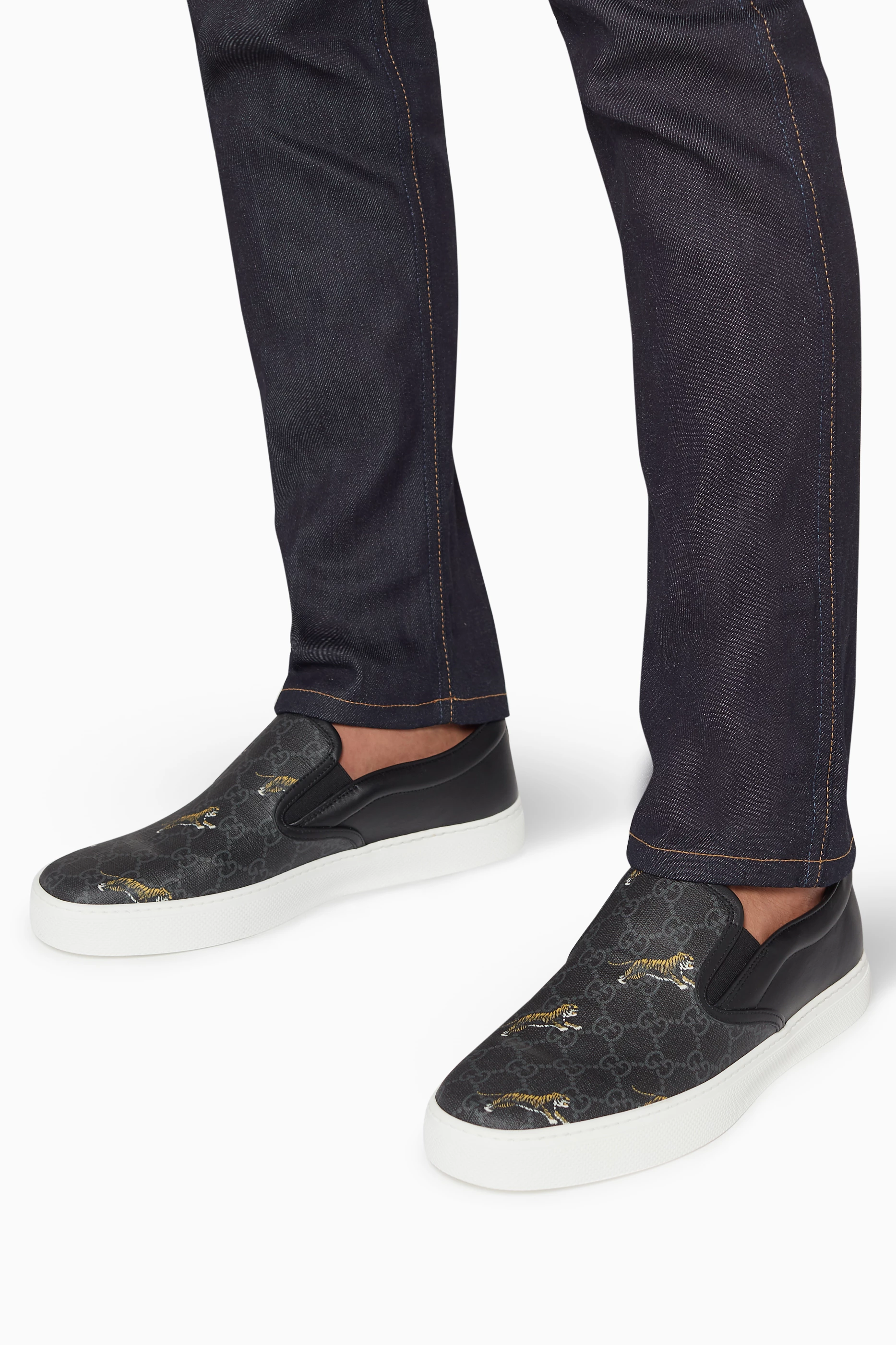 Gucci tiger slip ons hot sale
