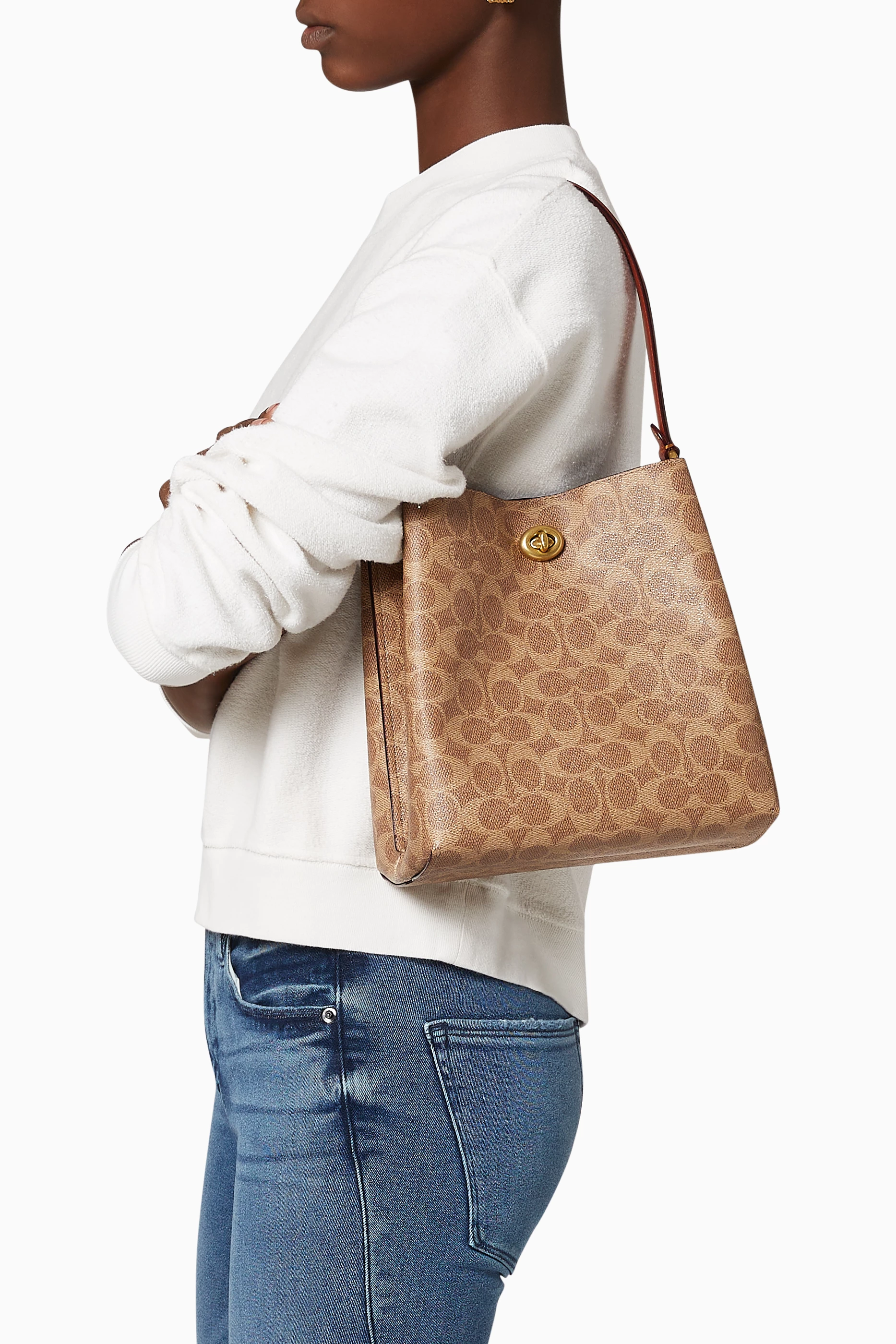 Coach coated canvas signature charlie bucket bag 2025