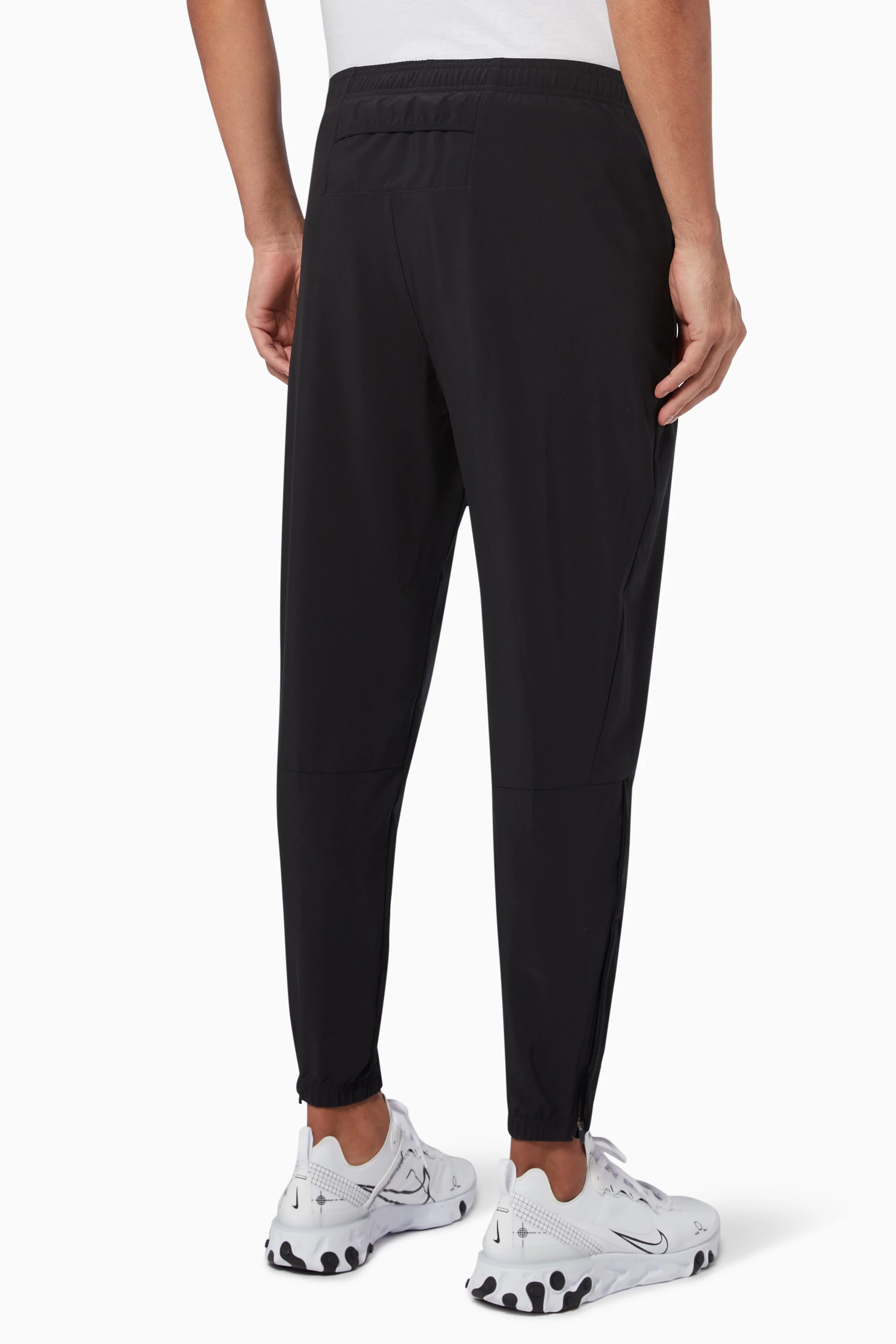 Nike running essential woven sweatpants in black 2025