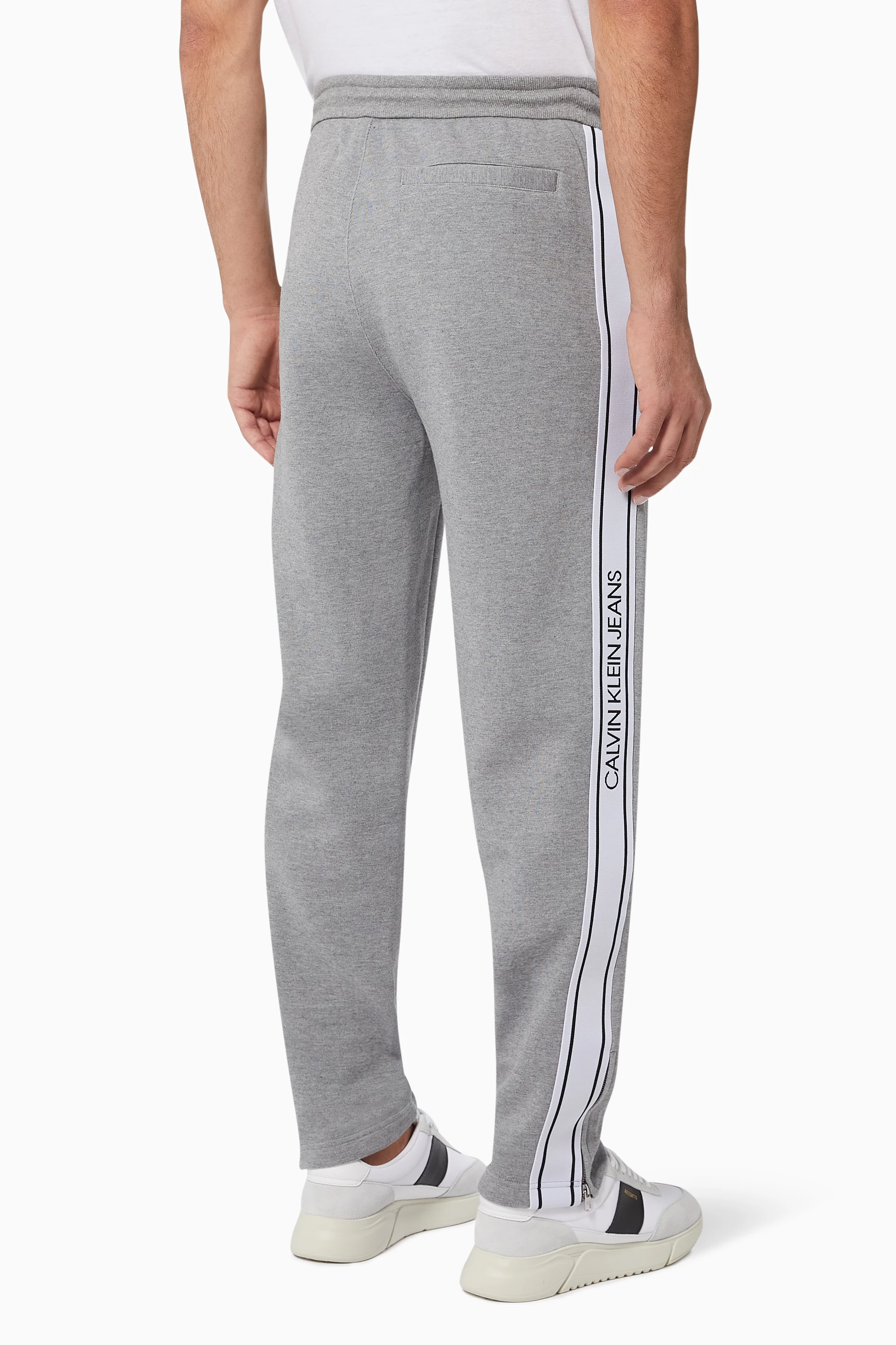 Buy Calvin Klein Jeans Grey Logo Tape Cotton Blend Sweatpants For Men Online Ounass UAE