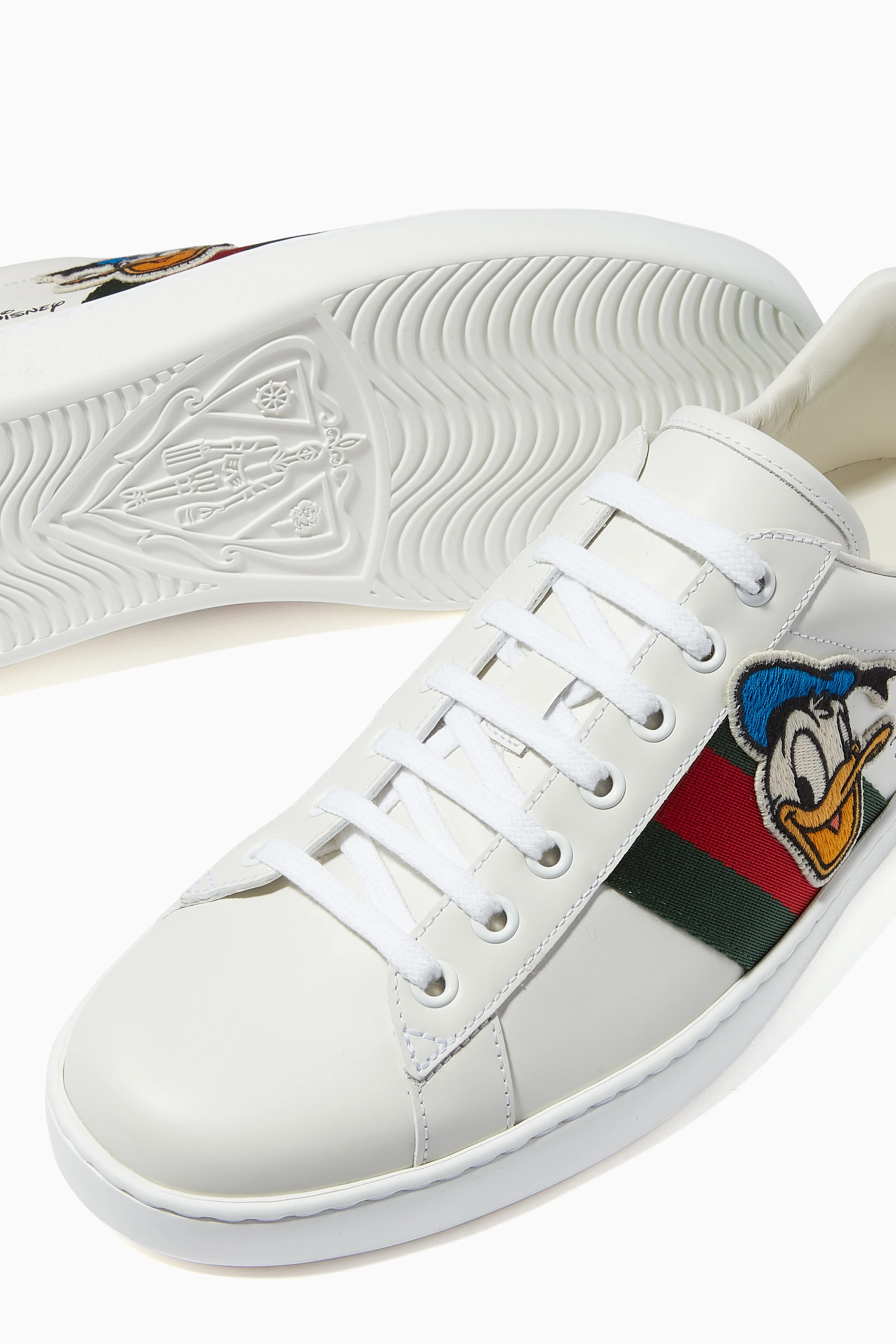 Gucci donald duck high tops on sale