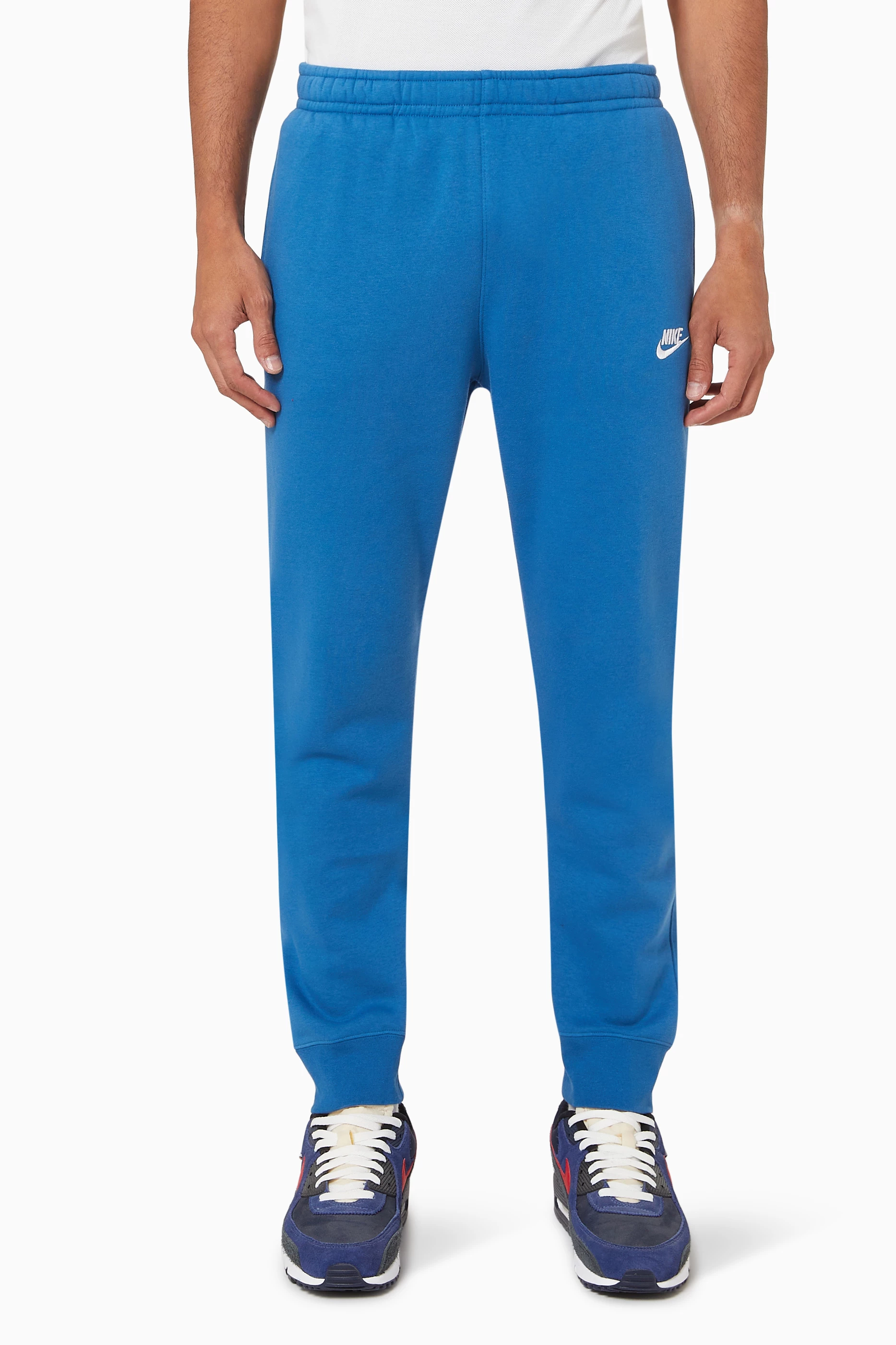 Nike club fleece pants blue best sale