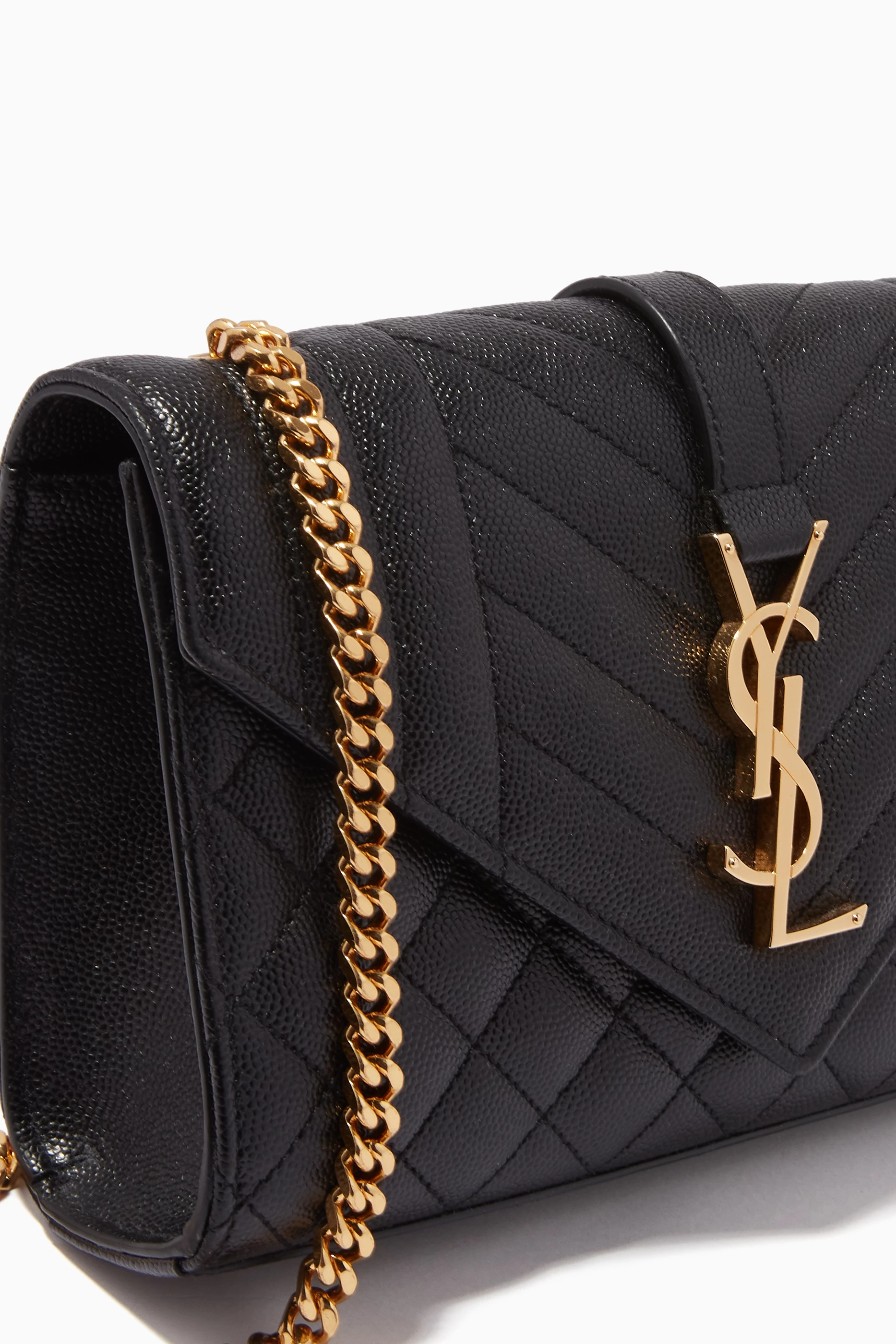 Ysl black and gold bag on sale