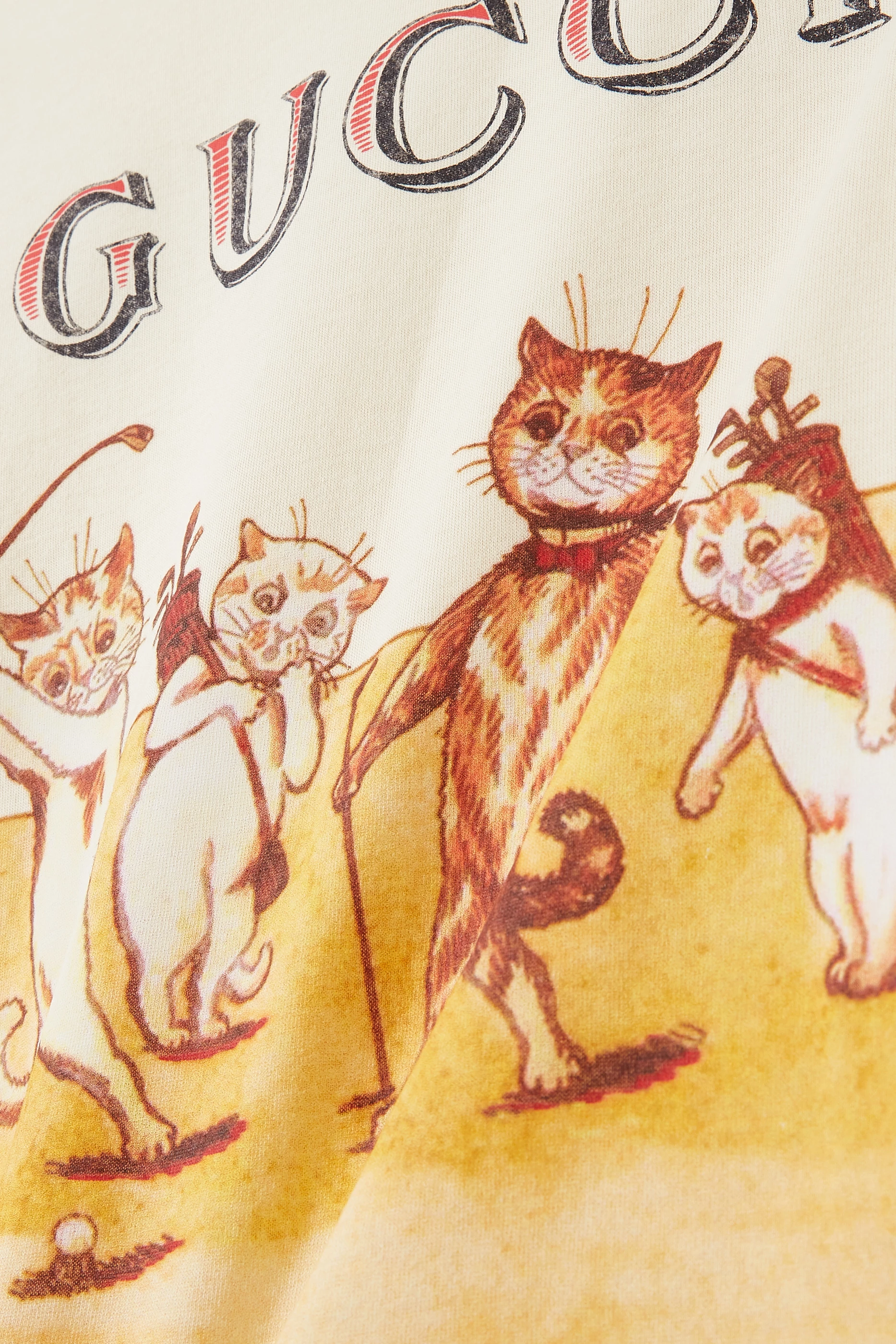 Buy Gucci Neutral Cat Playing Golf Print T shirt in Cotton For UNISEX Online Ounass UAE