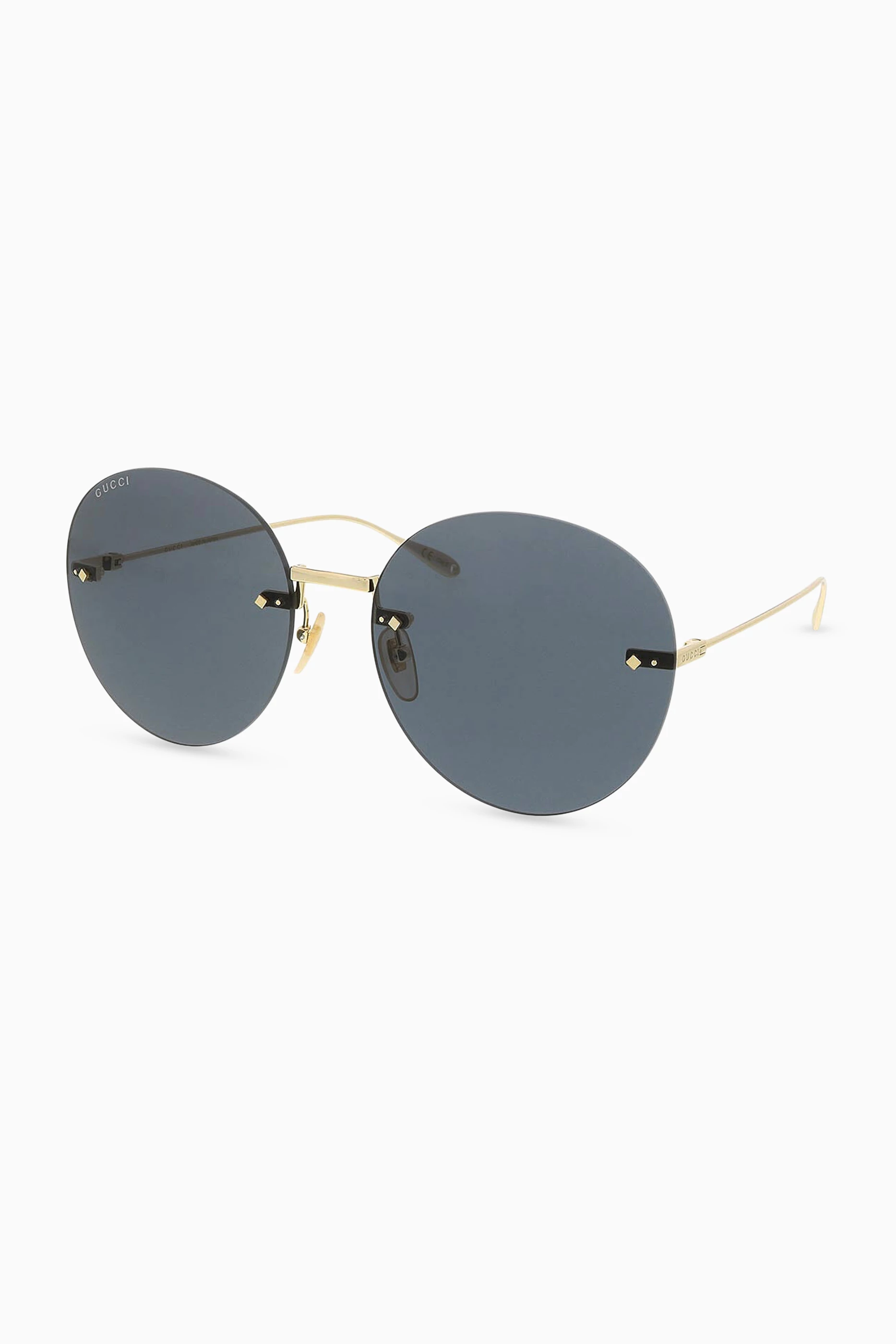 Gucci round frame metal sunglasses top