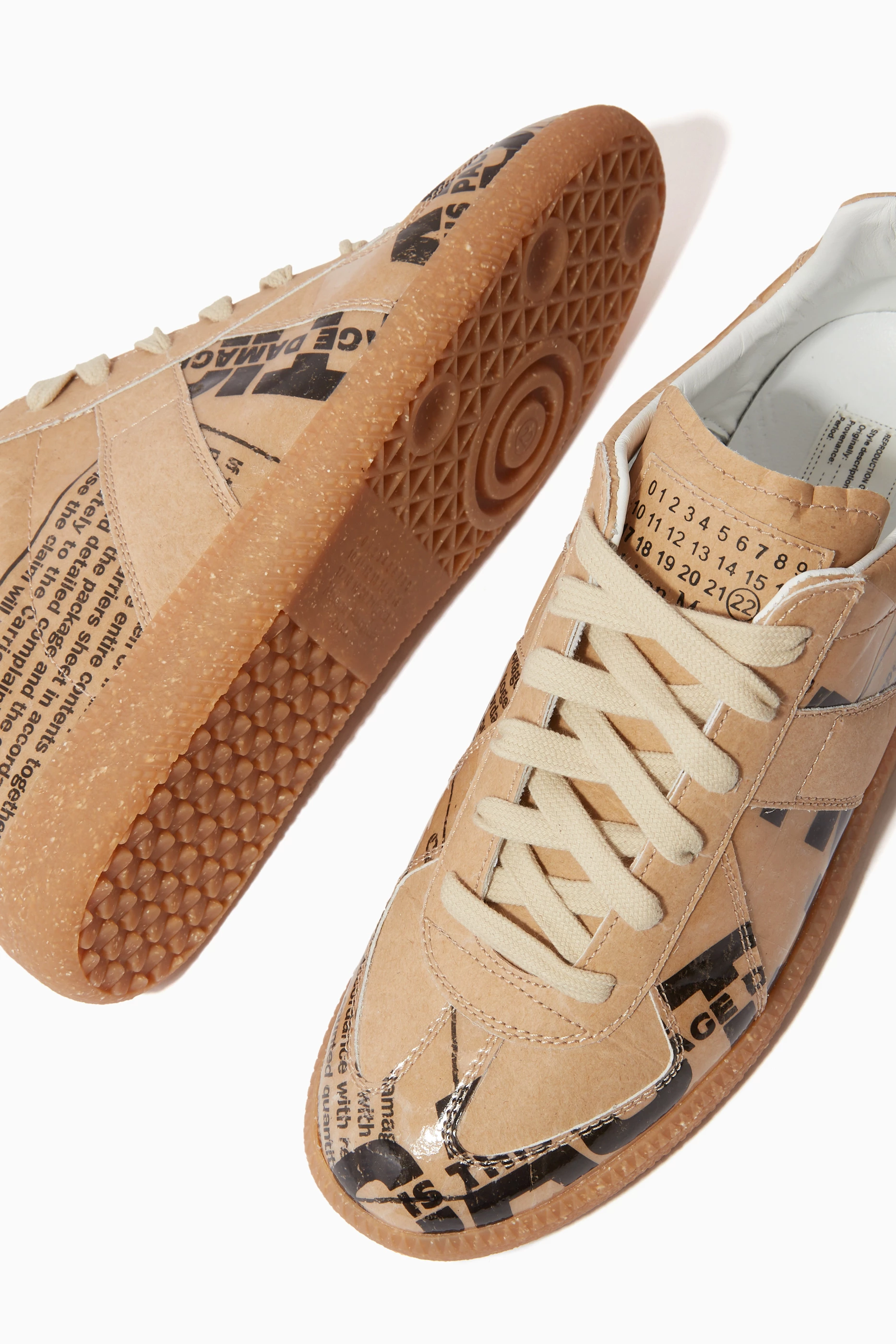 Buy Maison Margiela Neutral Replica Newspaper print Low top Sneakers in Faux Leather For Women Online Ounass UAE
