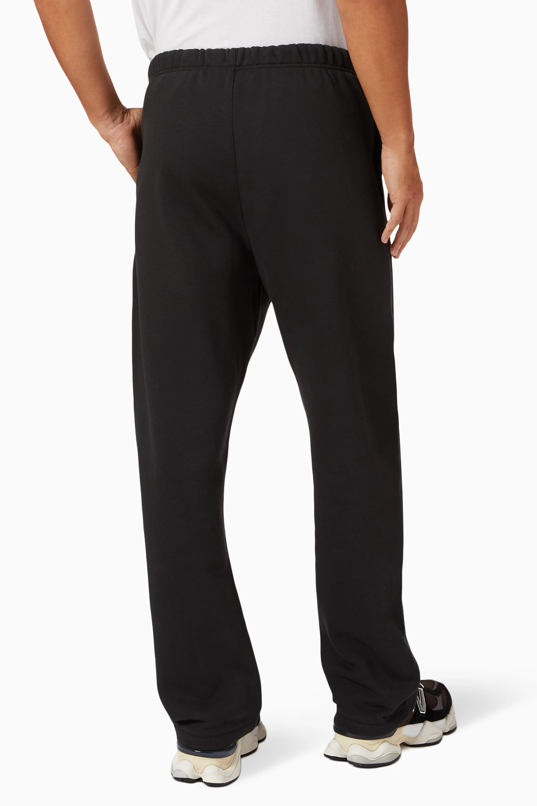 Buy Fear of God Essentials Black Relaxed Sweatpants in Fleece For Men Online Ounass UAE