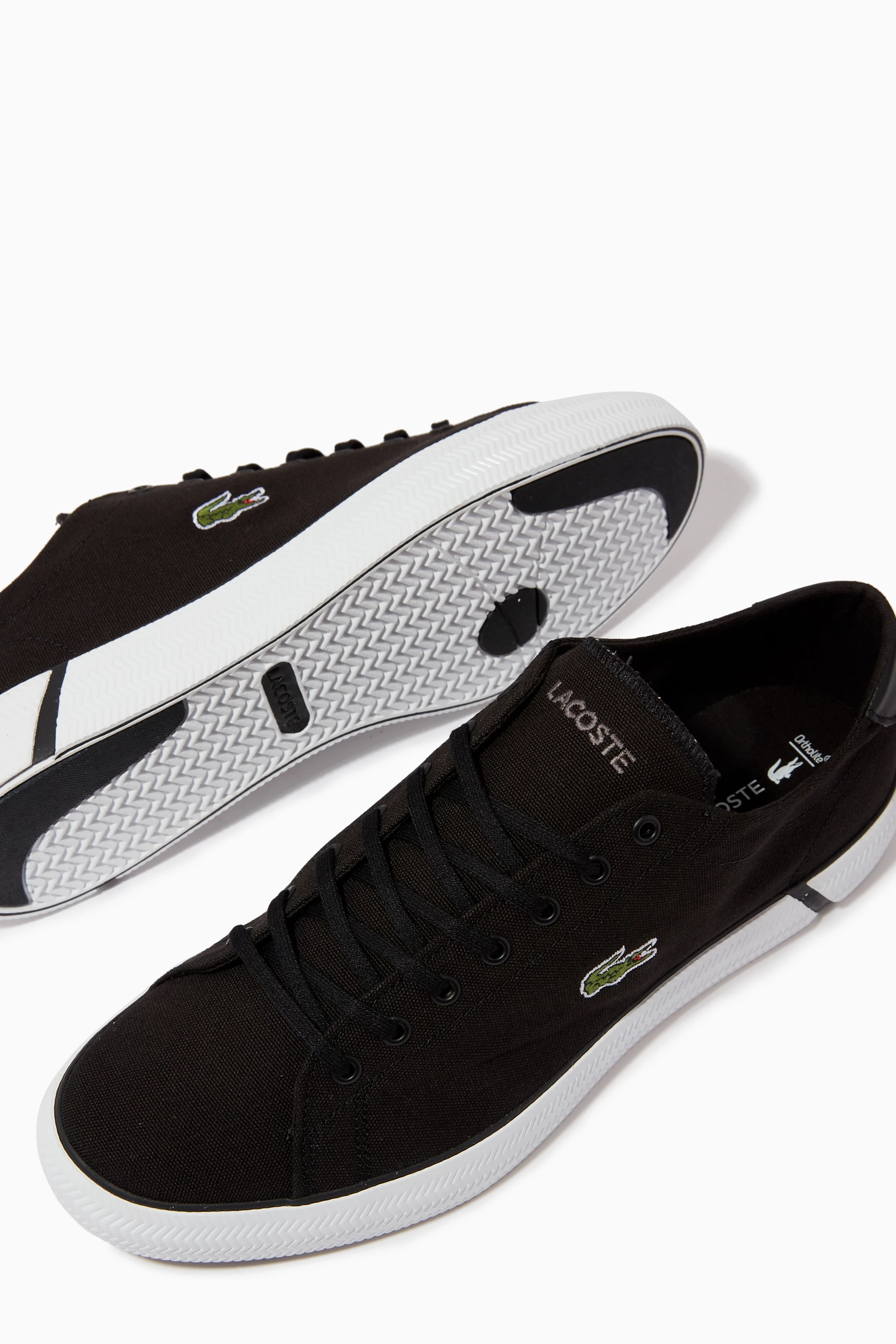 Buy Lacoste Black Gripshot Low top Sneakers in Canvas For Men Online Ounass UAE