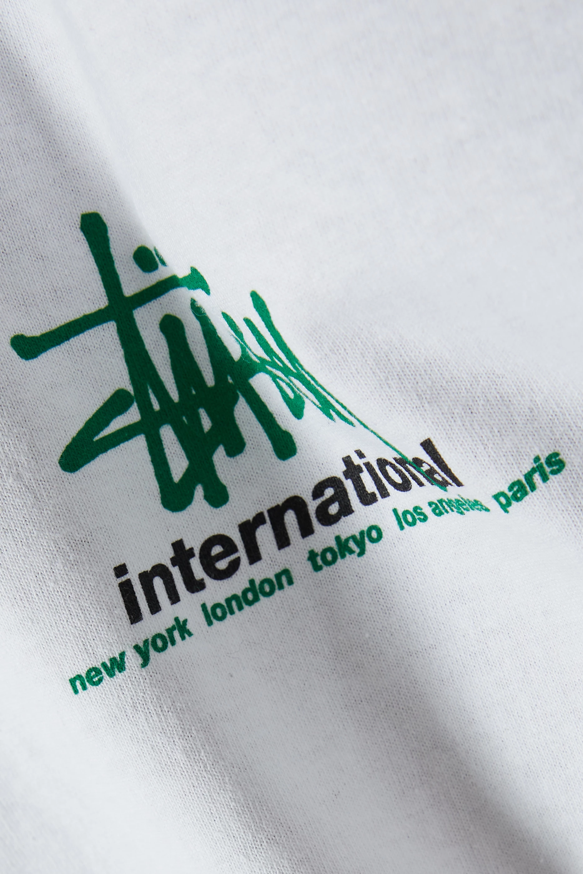 Buy Stussy White International T shirt in Cotton For Men Online Ounass UAE