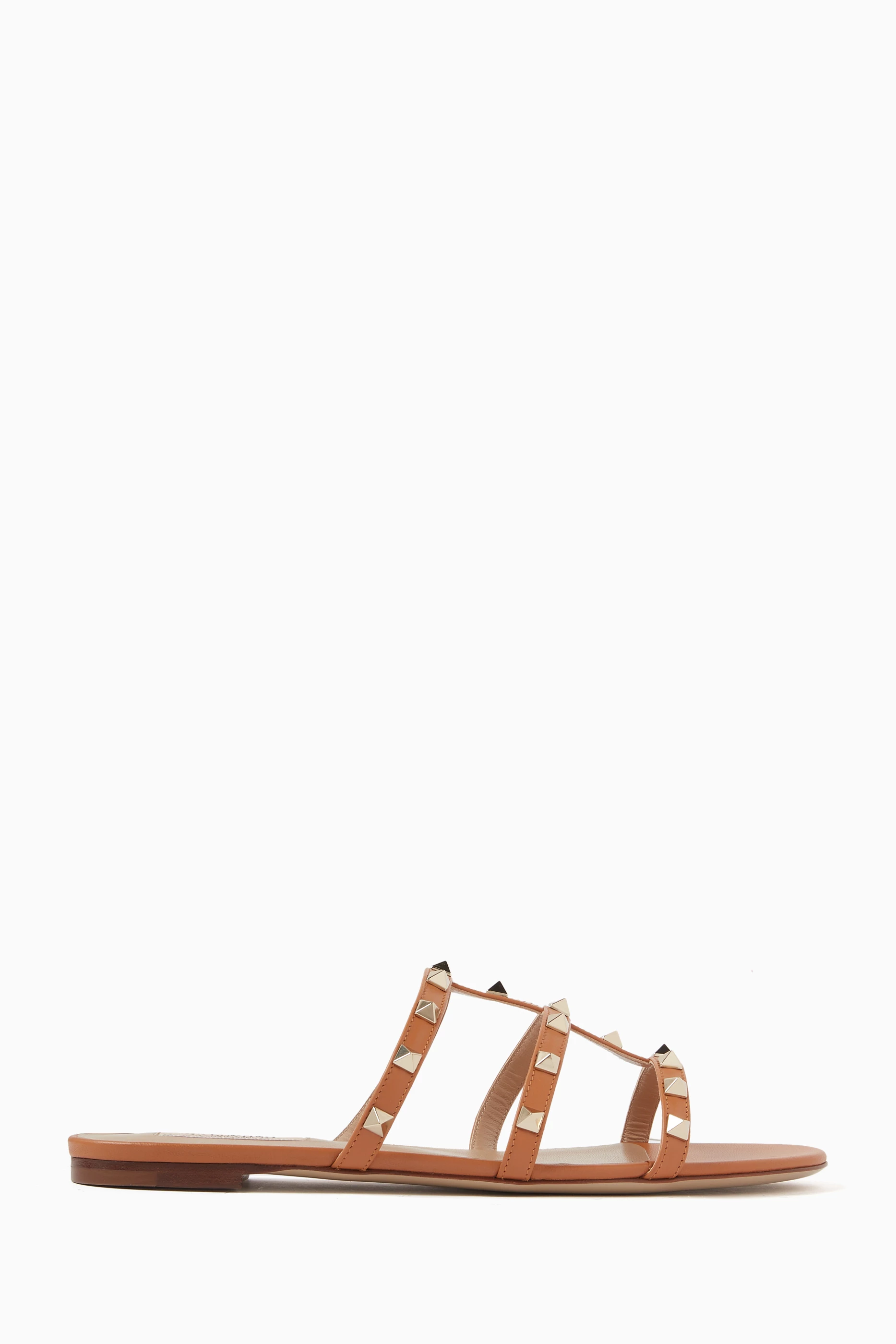 Buy Valentino Garavani Brown Valentino Garavani Rockstud Slides in Leather For Women Online Ounass UAE