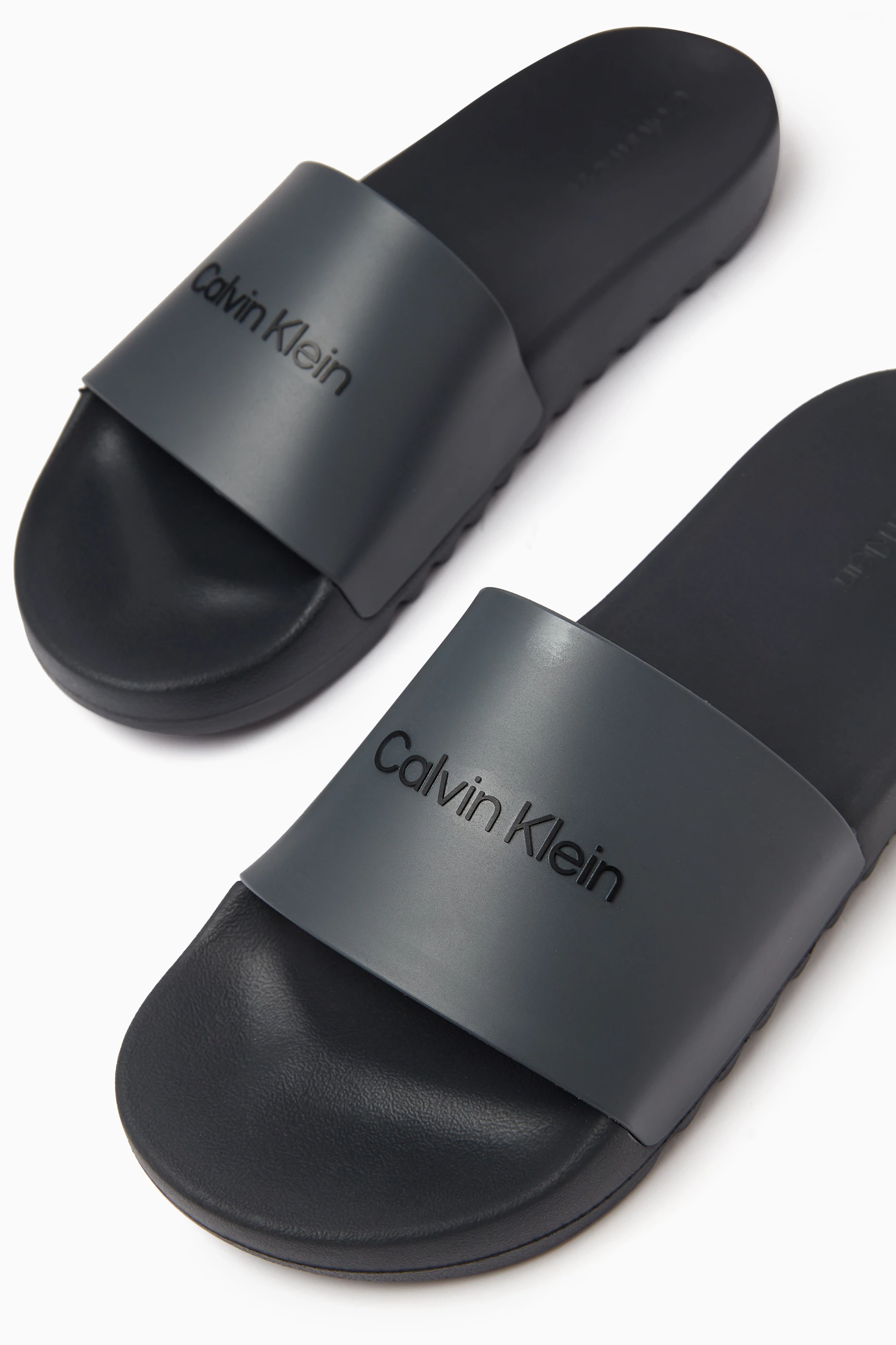 Buy Calvin Klein Grey City Logo Slides in TPU For Men Online Ounass UAE
