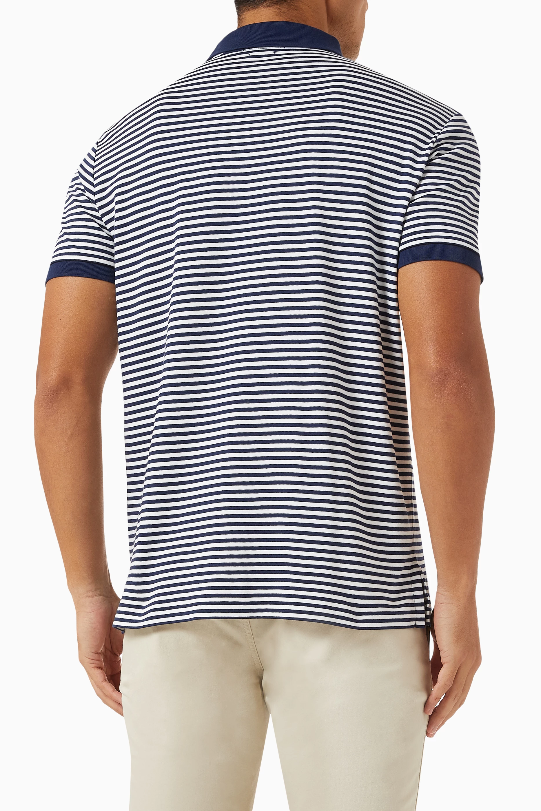 Striped blue polo shirt on sale