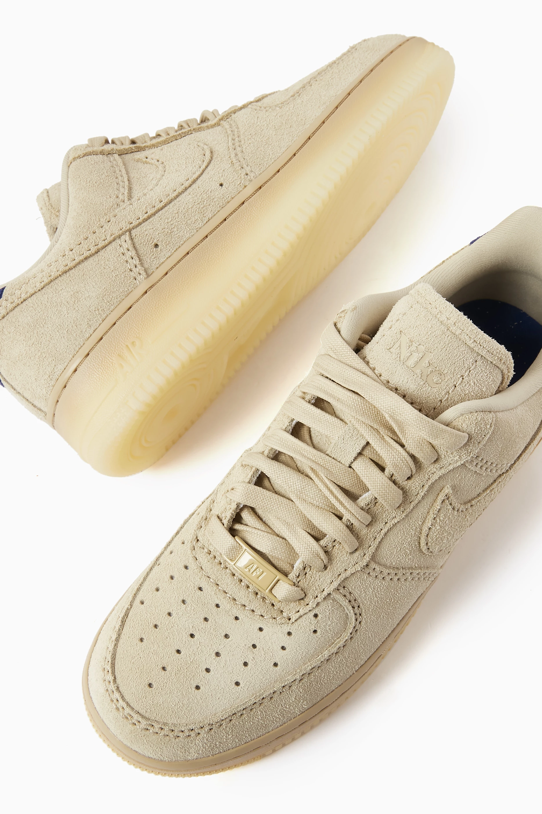 Buy Nike Neutral Air Force 1 Low top Sneakers in Shaggy Suede For Women Online Ounass UAE