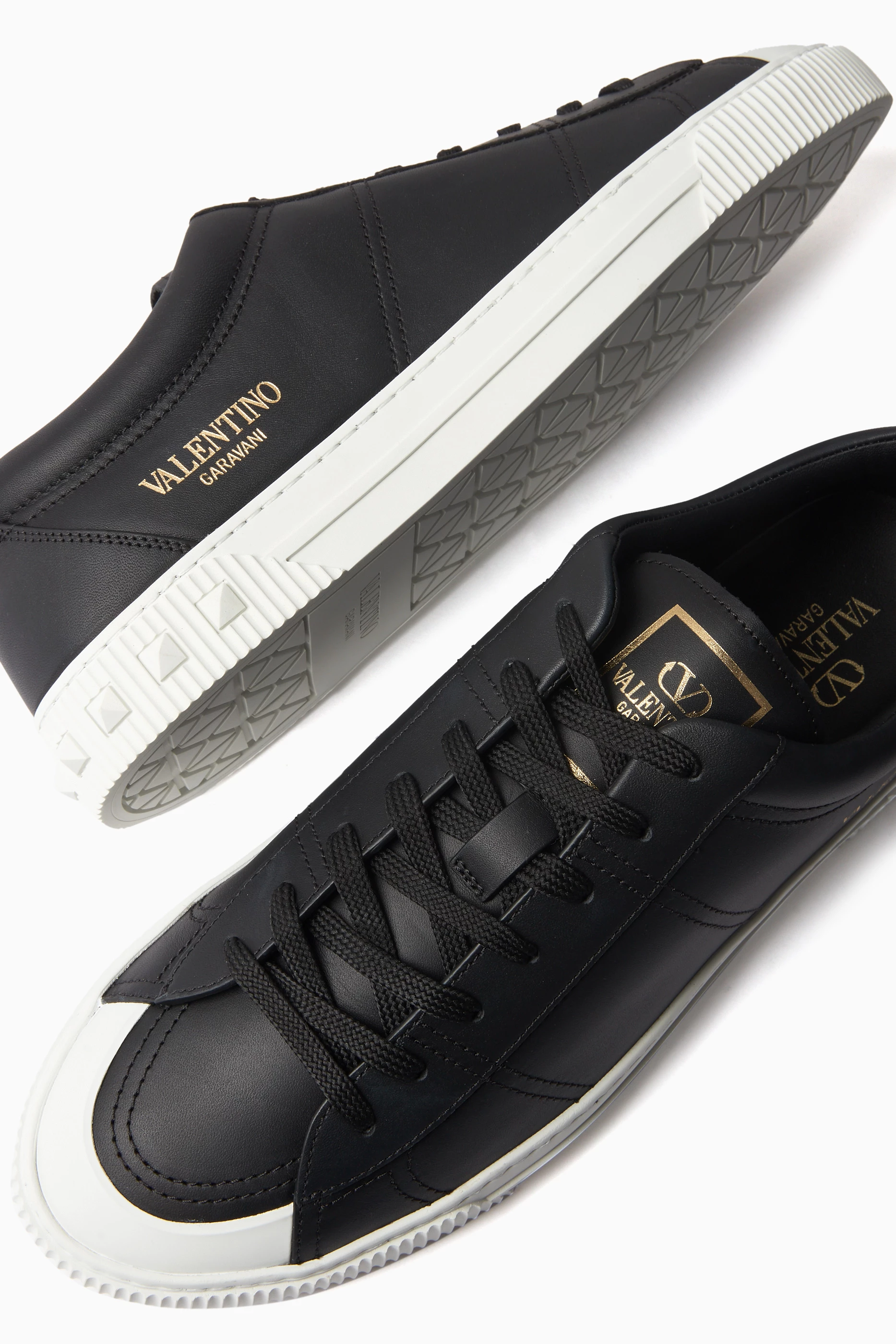 Buy Valentino Garavani Black Valentino Garavani City Planet Sneakers in Calfskin Leather For Men Online Ounass UAE