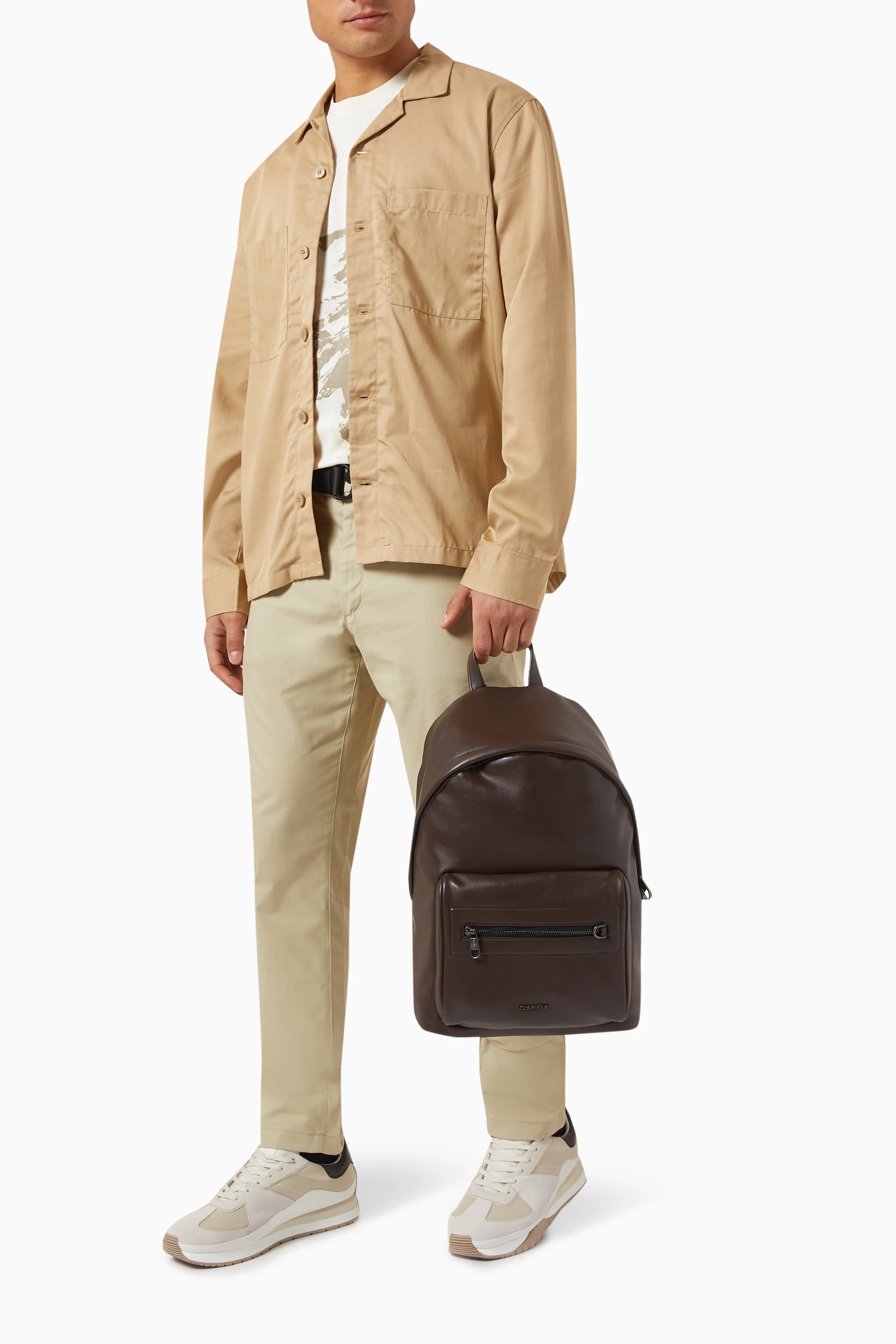 Calvin klein brown leather backpack deals