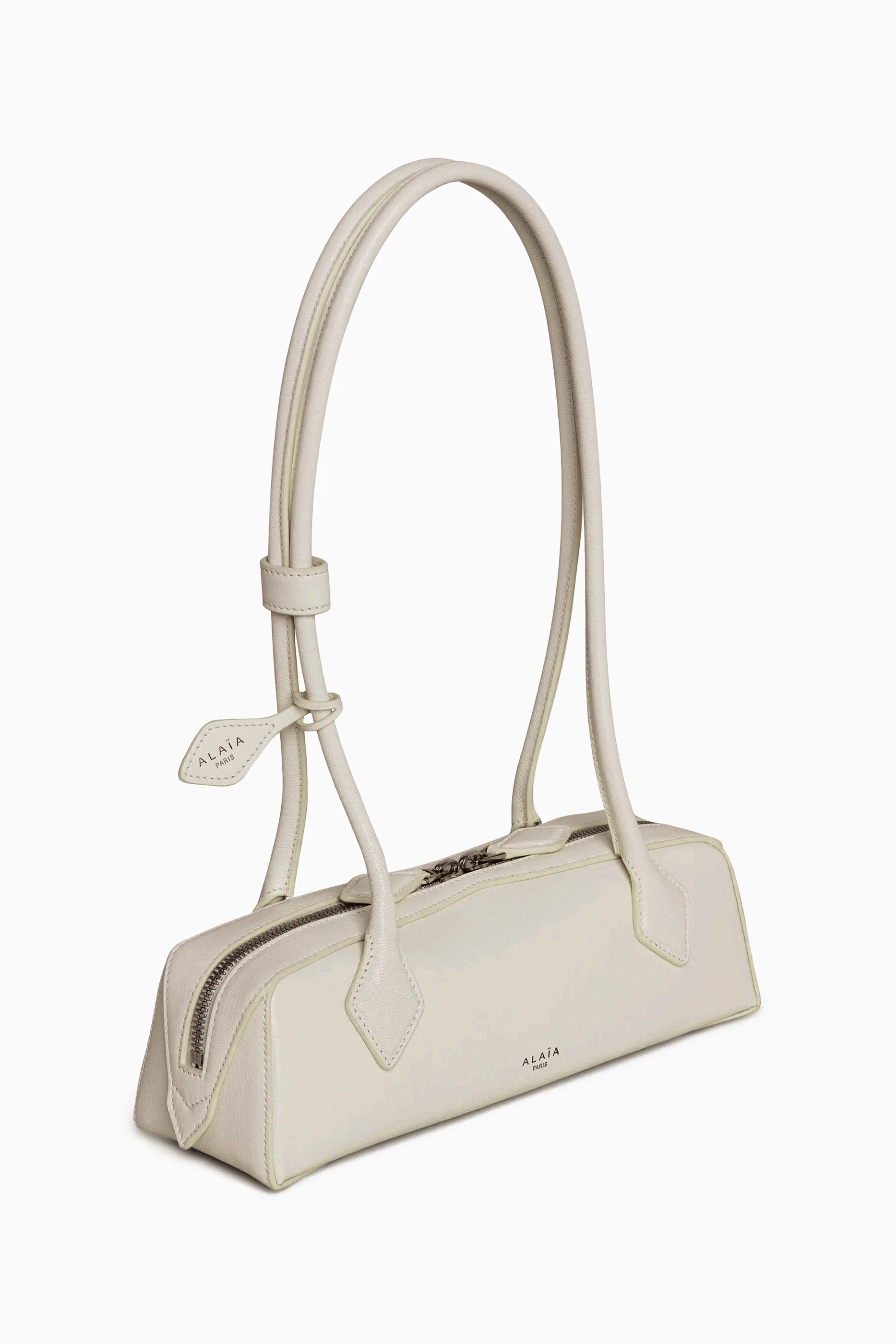 Buy Alaïa White Small Le Teckel Shoulder Bag in Leather For