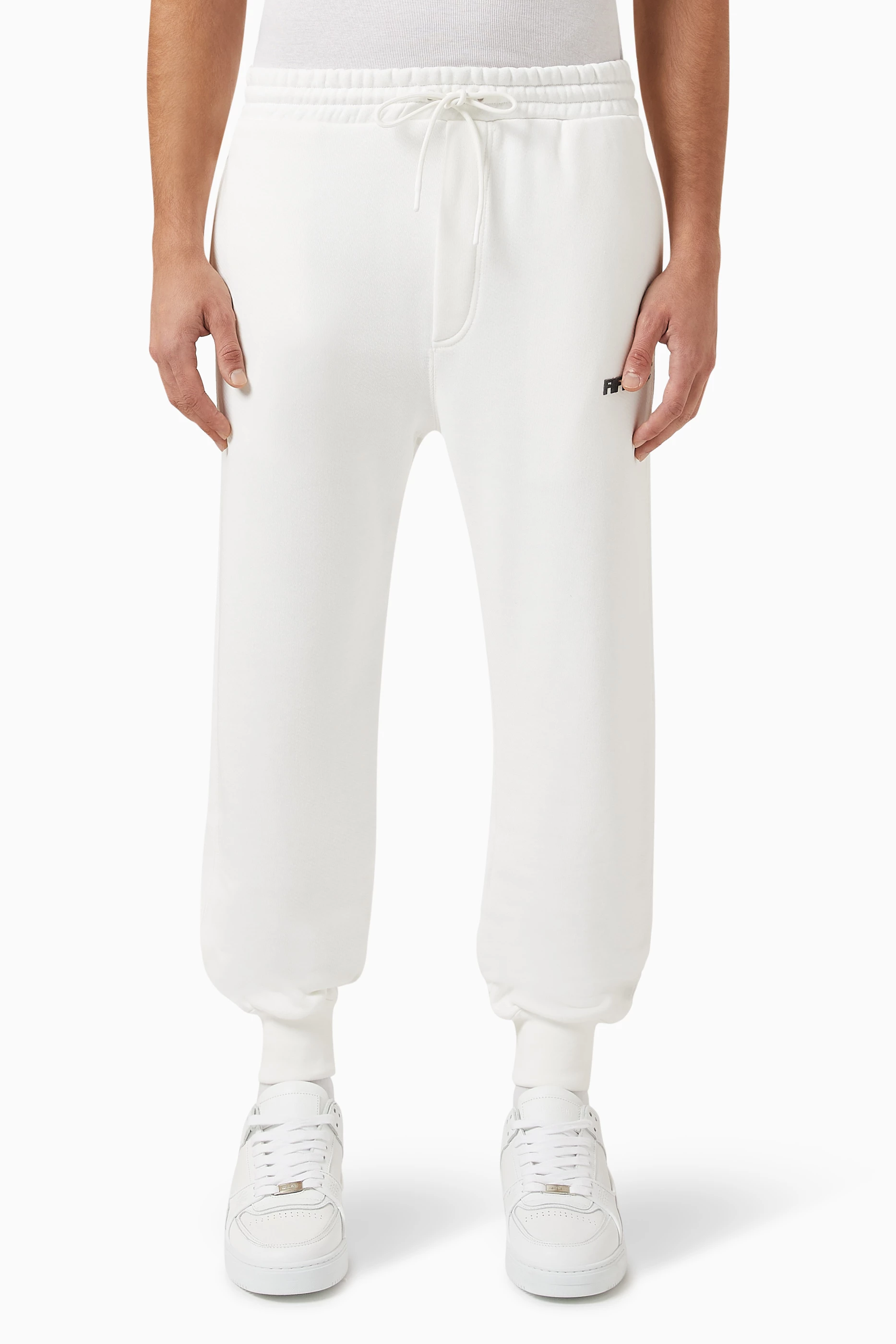 Buy Fifty Made Neutral Regular fit Logo Sweatpants in Organic Cotton For Men Online Ounass UAE