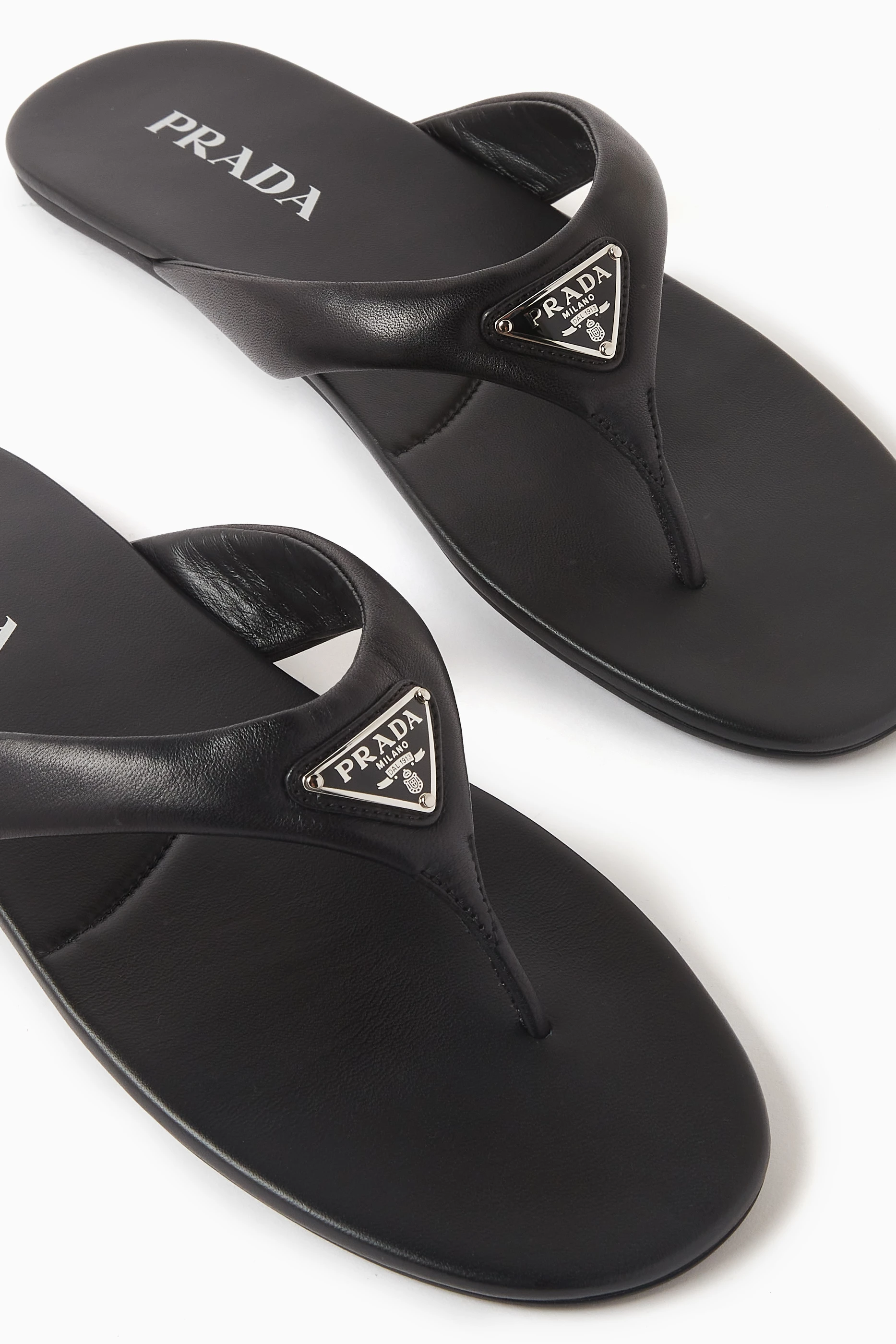 Buy Prada Black Triangle Logo Flip flop Sandals in Leather For Women Online Ounass UAE
