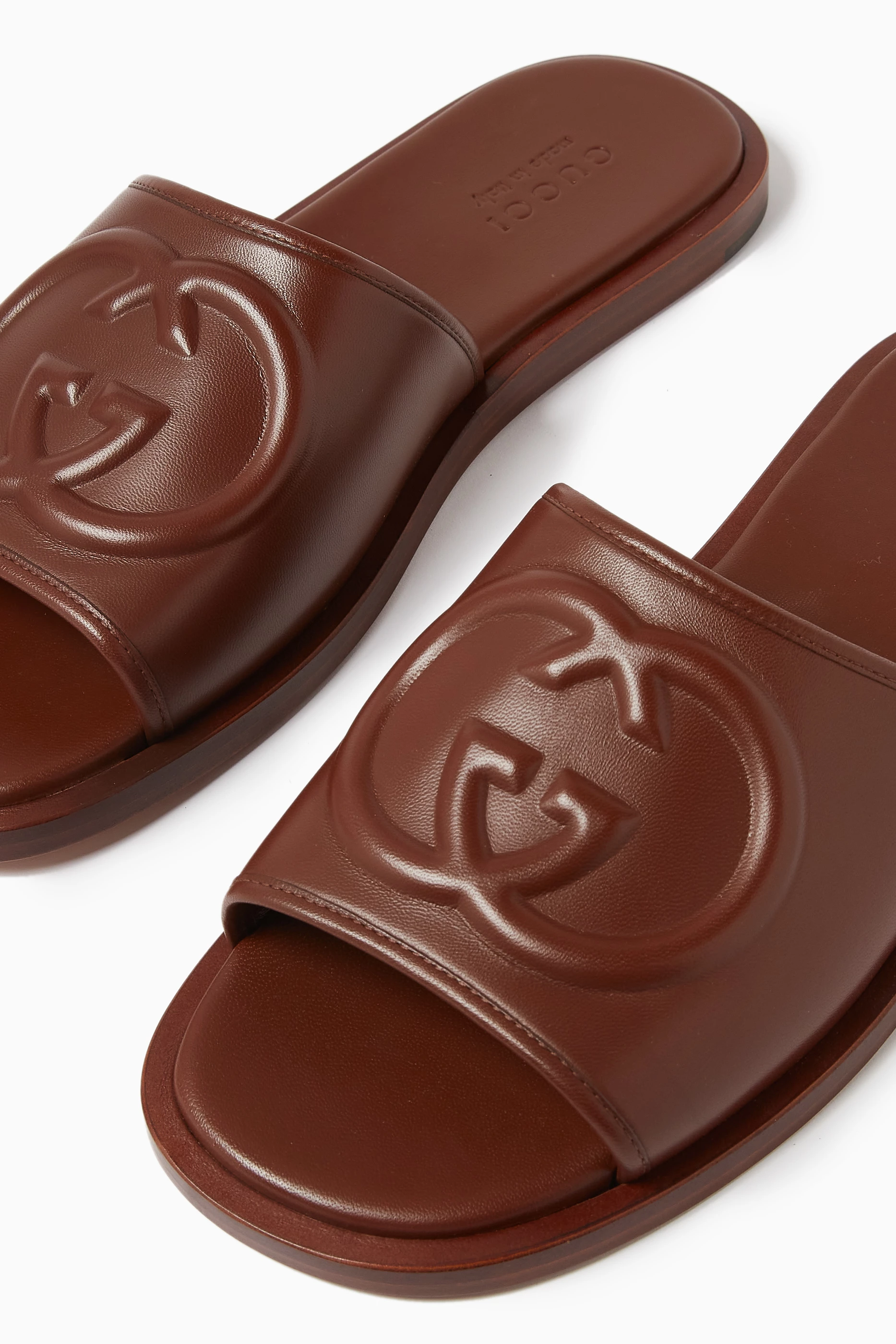 Gucci leather slides discount