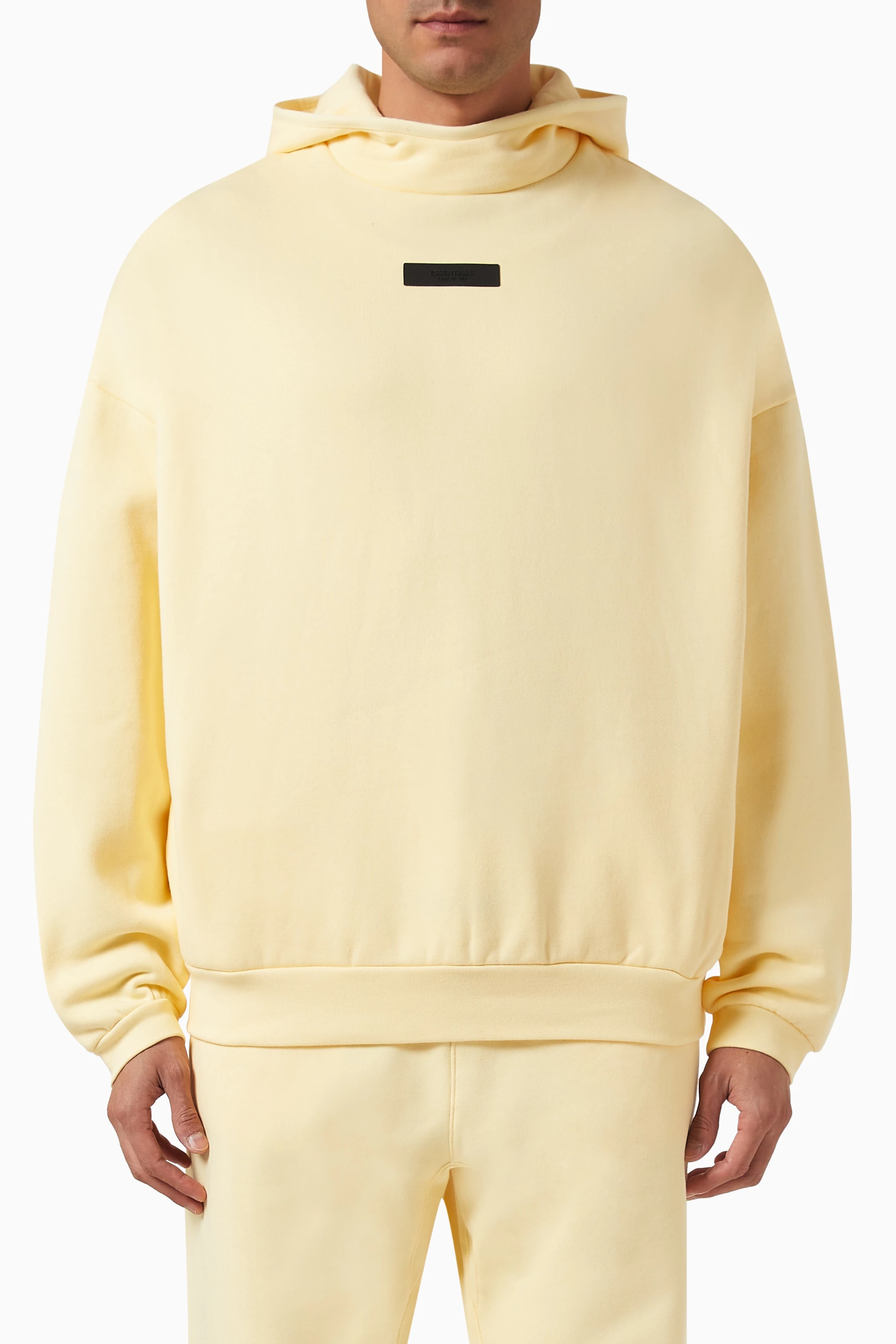 Essentials yellow hoodie top