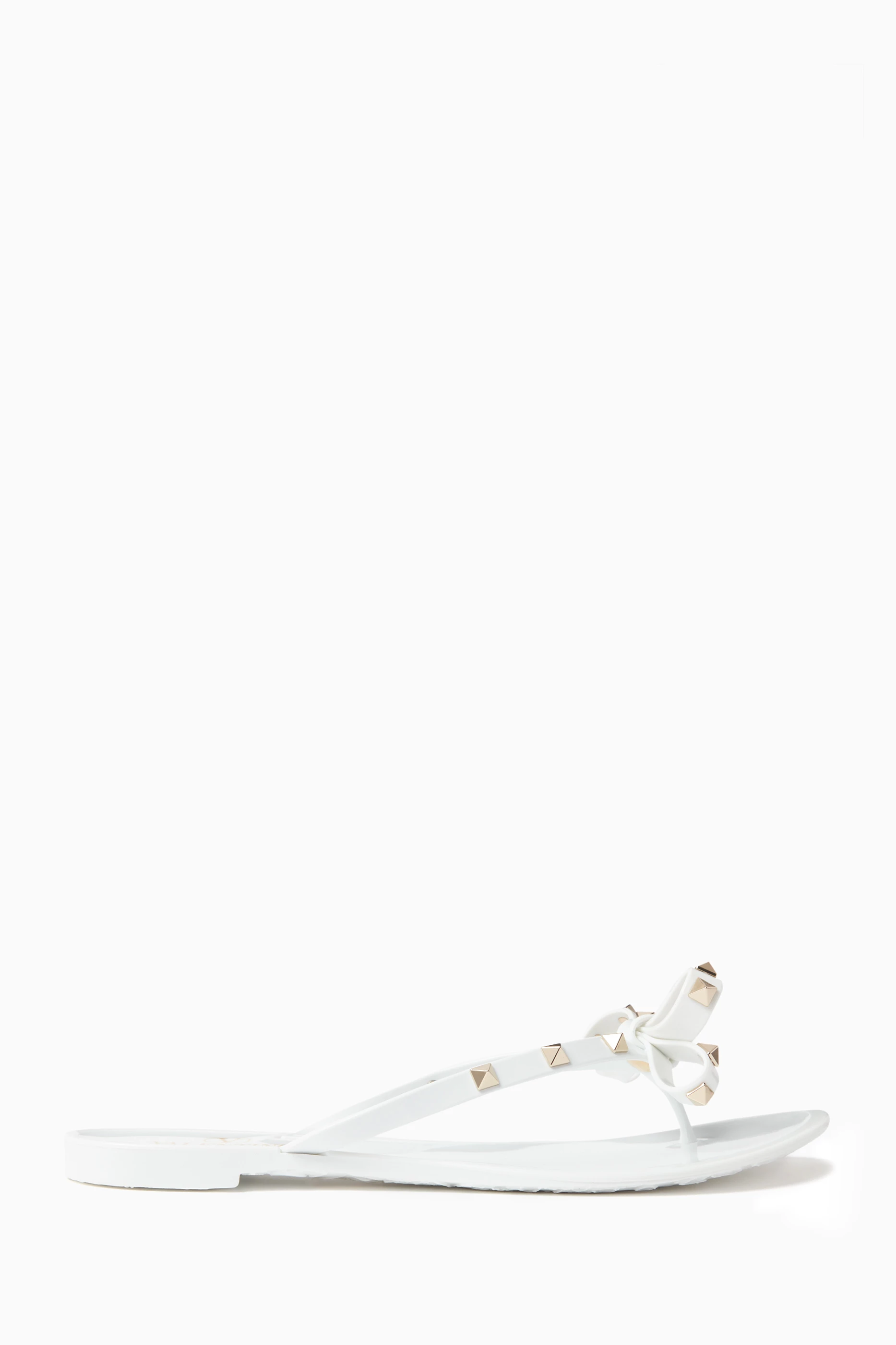 Buy Valentino Garavani White Valentino Garavani Rockstud Flat Sandals in PVC For Women Online Ounass UAE