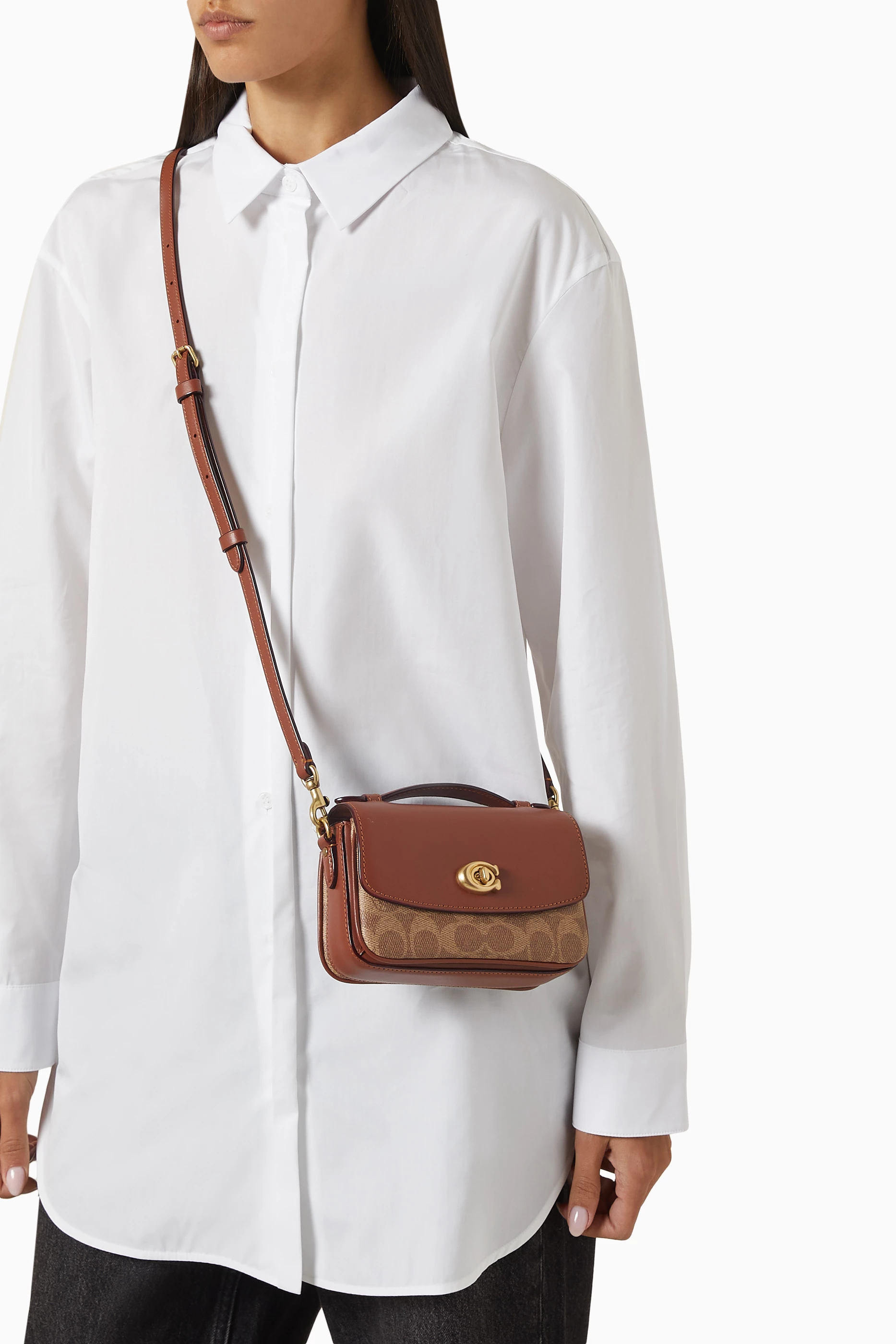 Buy Coach Brown Cassie 17 Crossbody Bag in Signature Canvas 