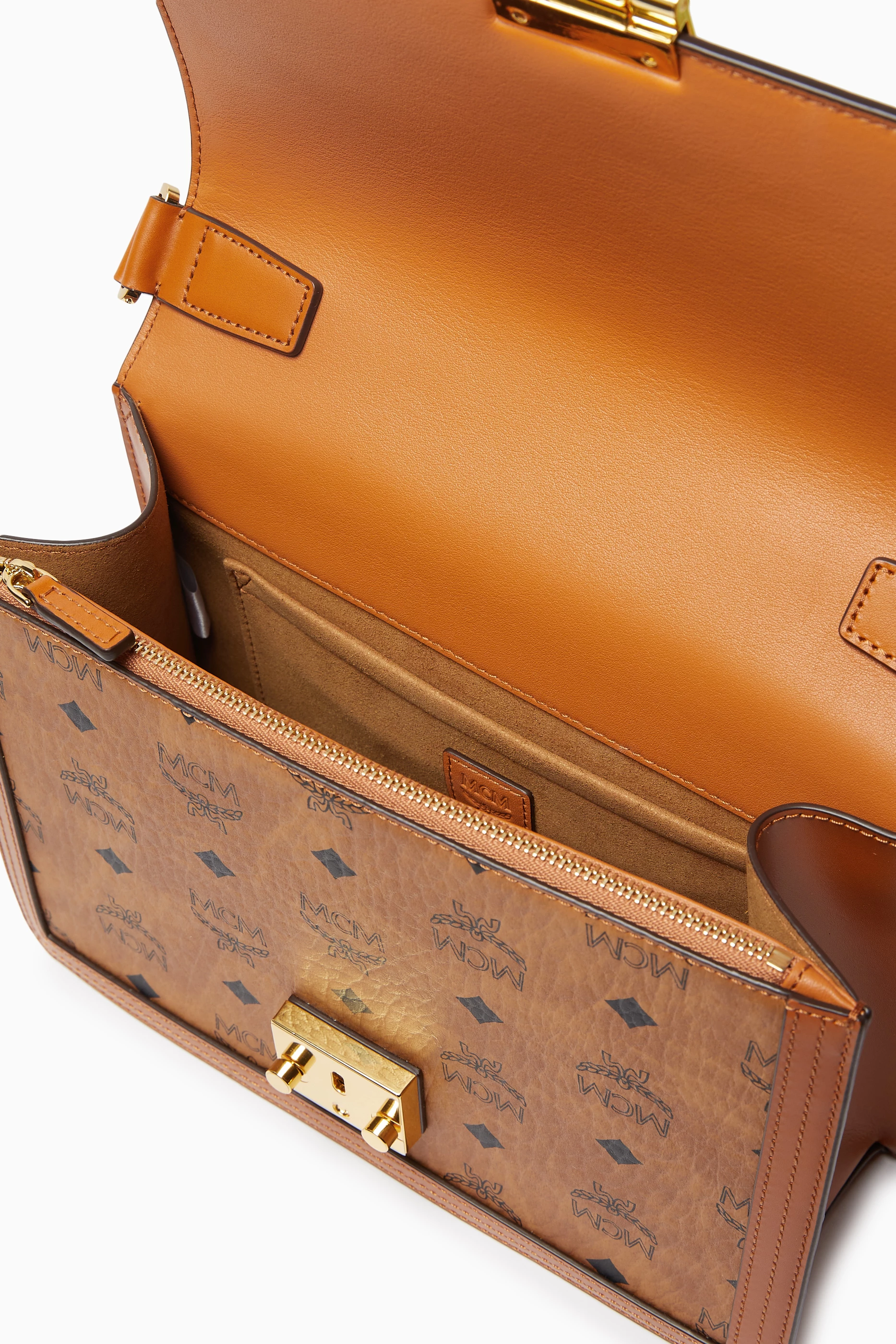 Buy MCM Brown Diamond Flap Shoulder Bag in Visetos For Men Online Ounass UAE