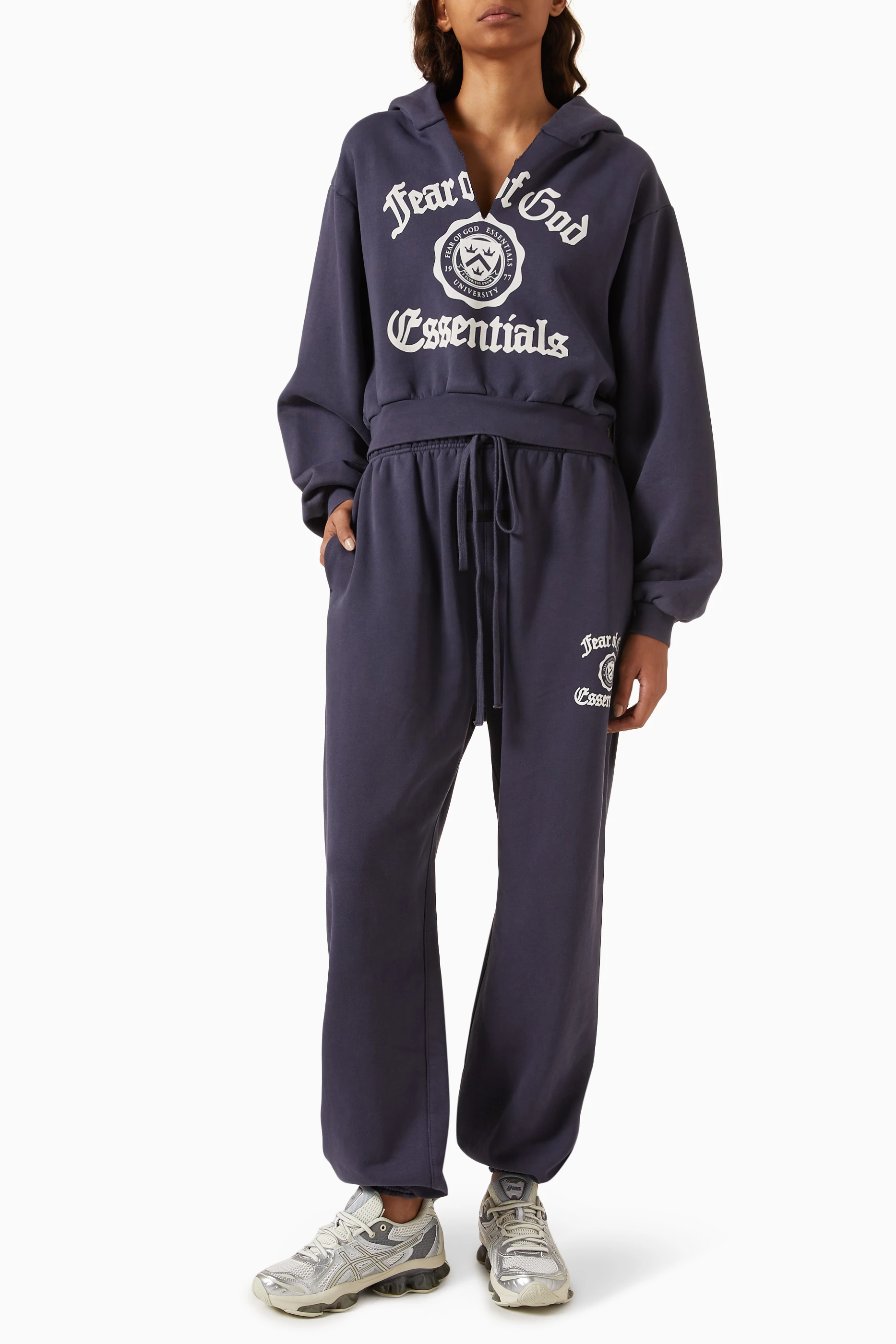 Buy Fear of God Essentials Blue Crest Logo Sweatpants in Fleece