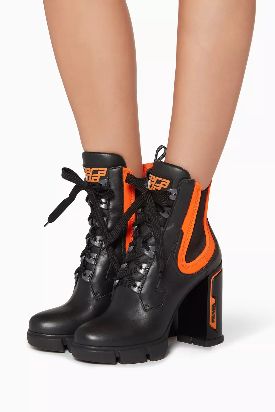 Orange and best sale black prada boots