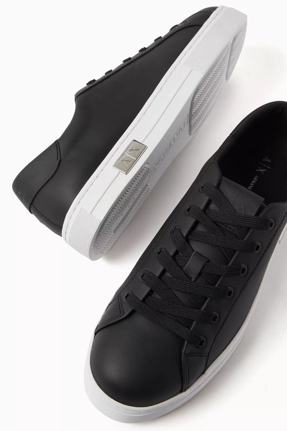 Buy Armani Exchange Black Low Top Sneakers in Leather for Women in UAE Ounass