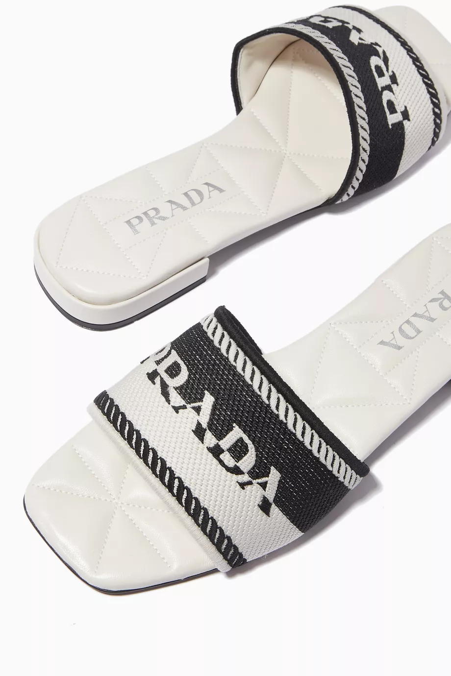 White prada slides top