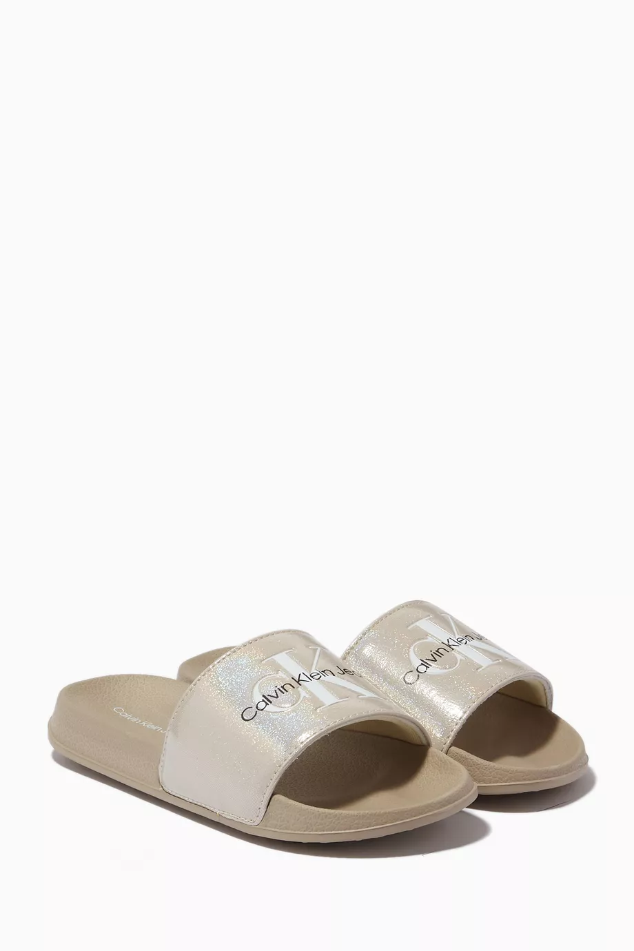 Buy Calvin Klein Neutral Logo Print Pool Slides for Girls in UAE
