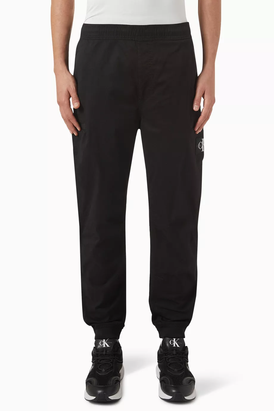 Buy Calvin Klein Jeans Black Logo Badge Pants in Cotton for Men in
