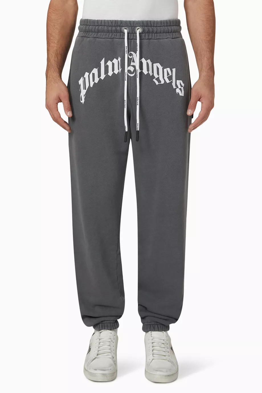 Buy Palm Angels Black Curved Logo Sweatpants in Cotton for Men in UAE Ounass