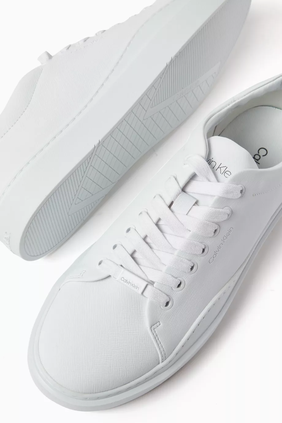 Buy Calvin Klein White Supernatural Low top Sneakers in Leather for Men in UAE Ounass