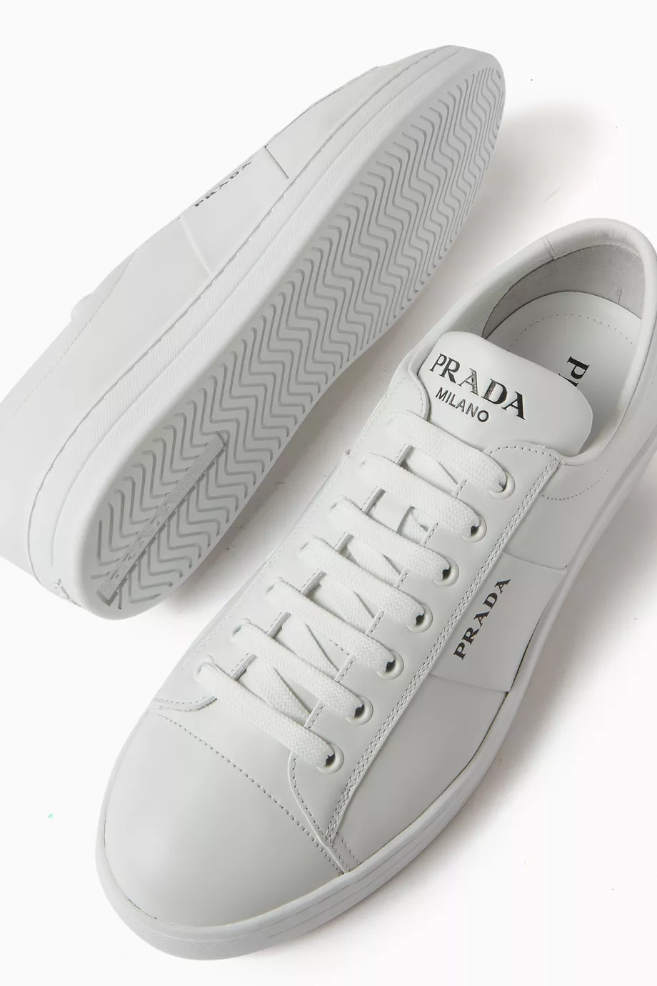 Buy Prada White Vitello Low top Sneakers in Brushed leather for